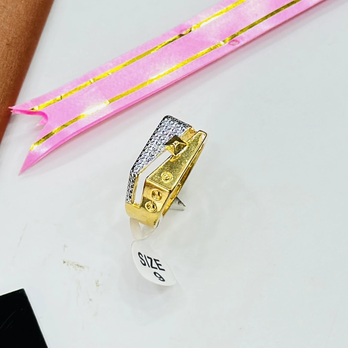 gents gold ring with American diamond embellishments