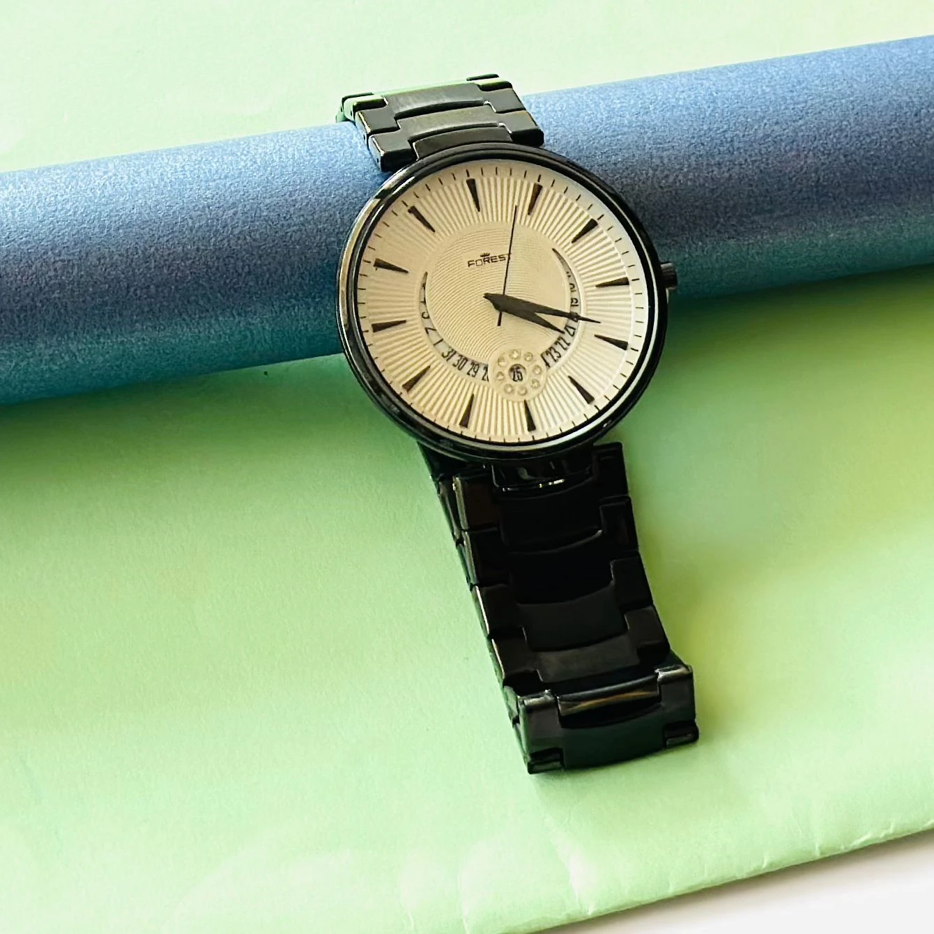 Forest Analog Watch for Men with a black metal strap.