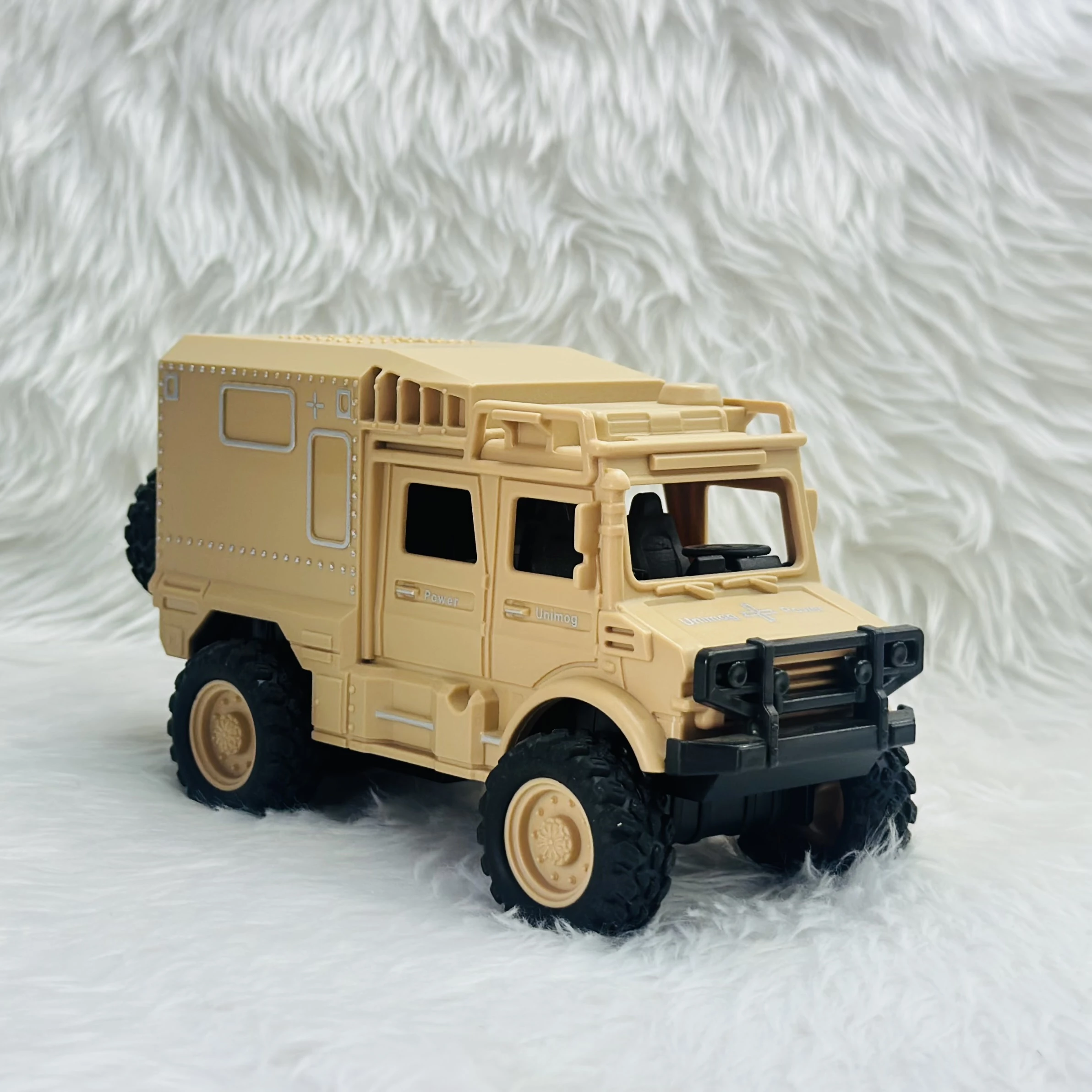 Toy Club Unimog army truck toy.