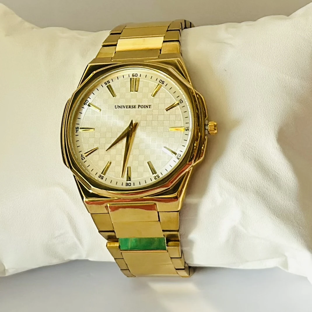 Analog Watch with a golden dial and stainless steel strap