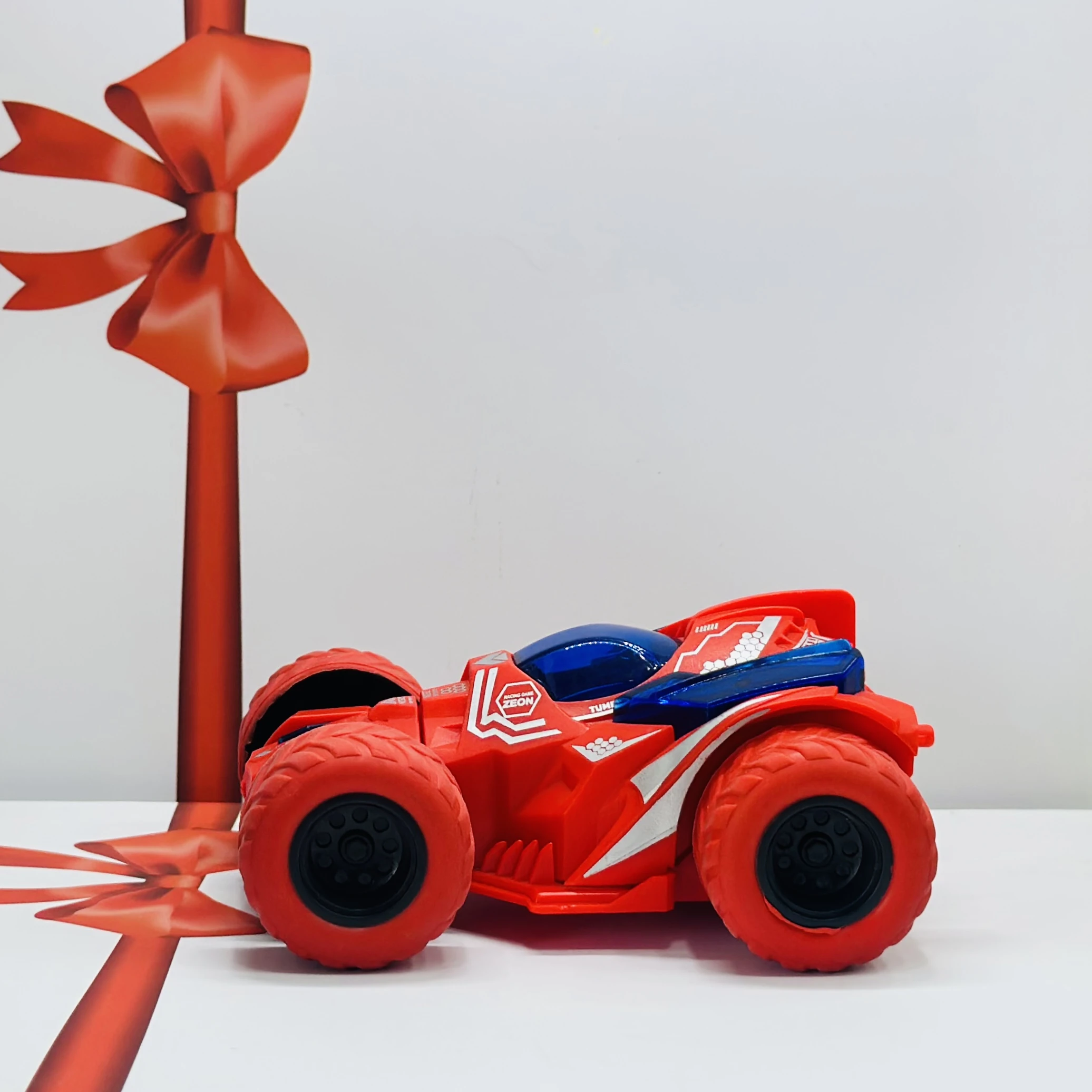 friction-powered toy stunt car