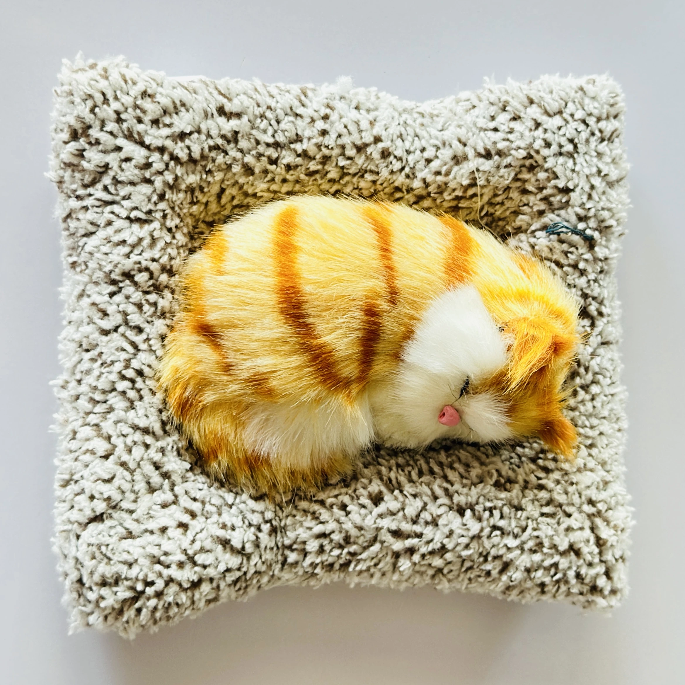 Realistic sleeping cat plush toy