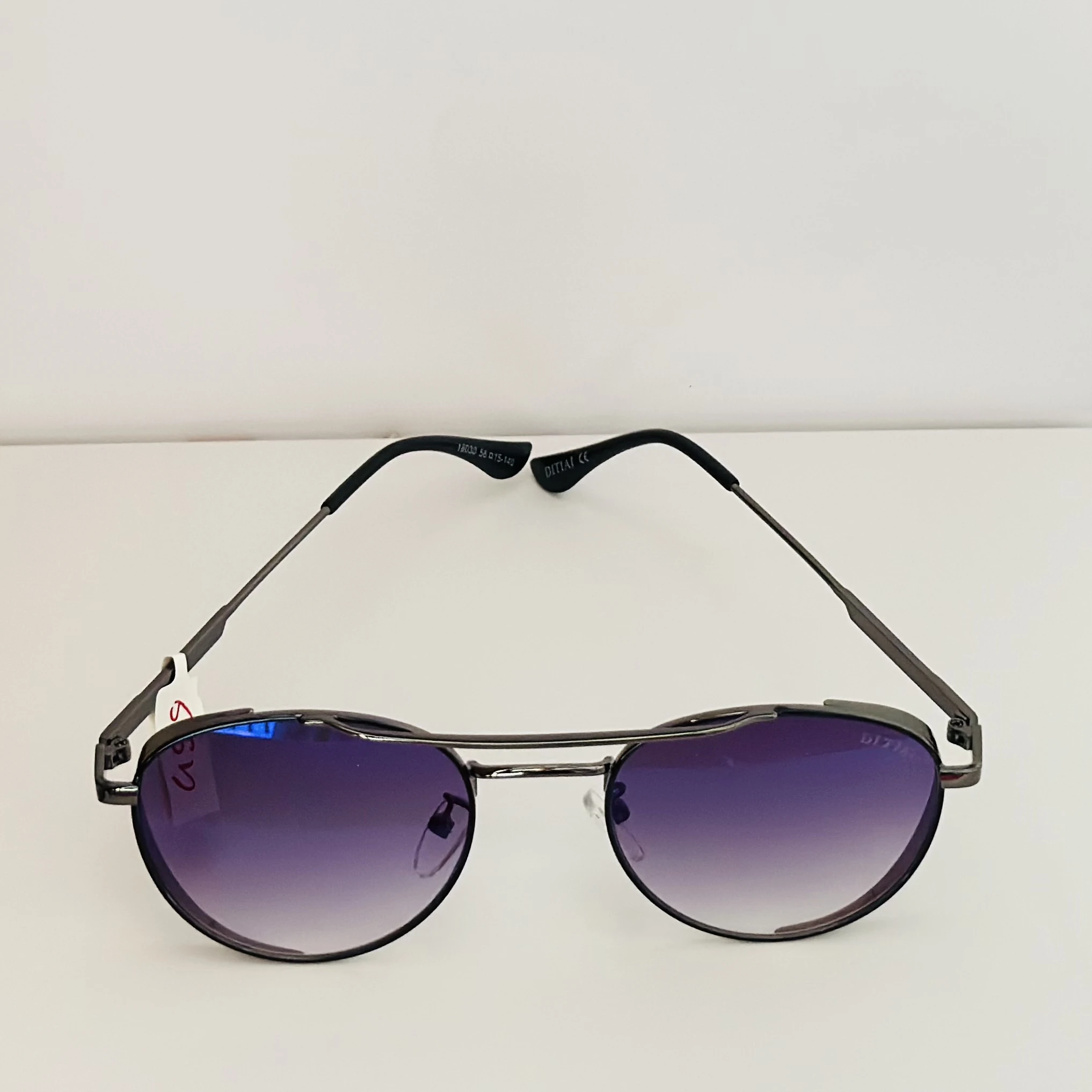 Round gunmetal-toned sunglasses