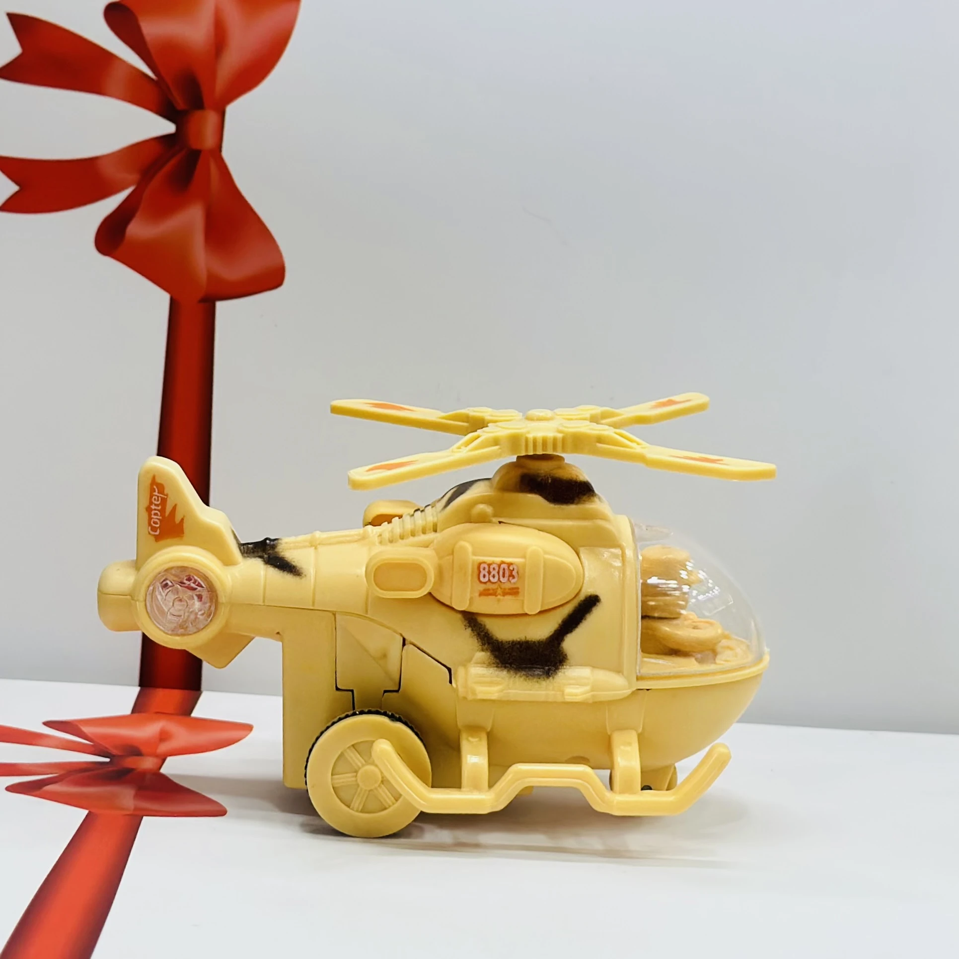 friction-powered toy helicopter