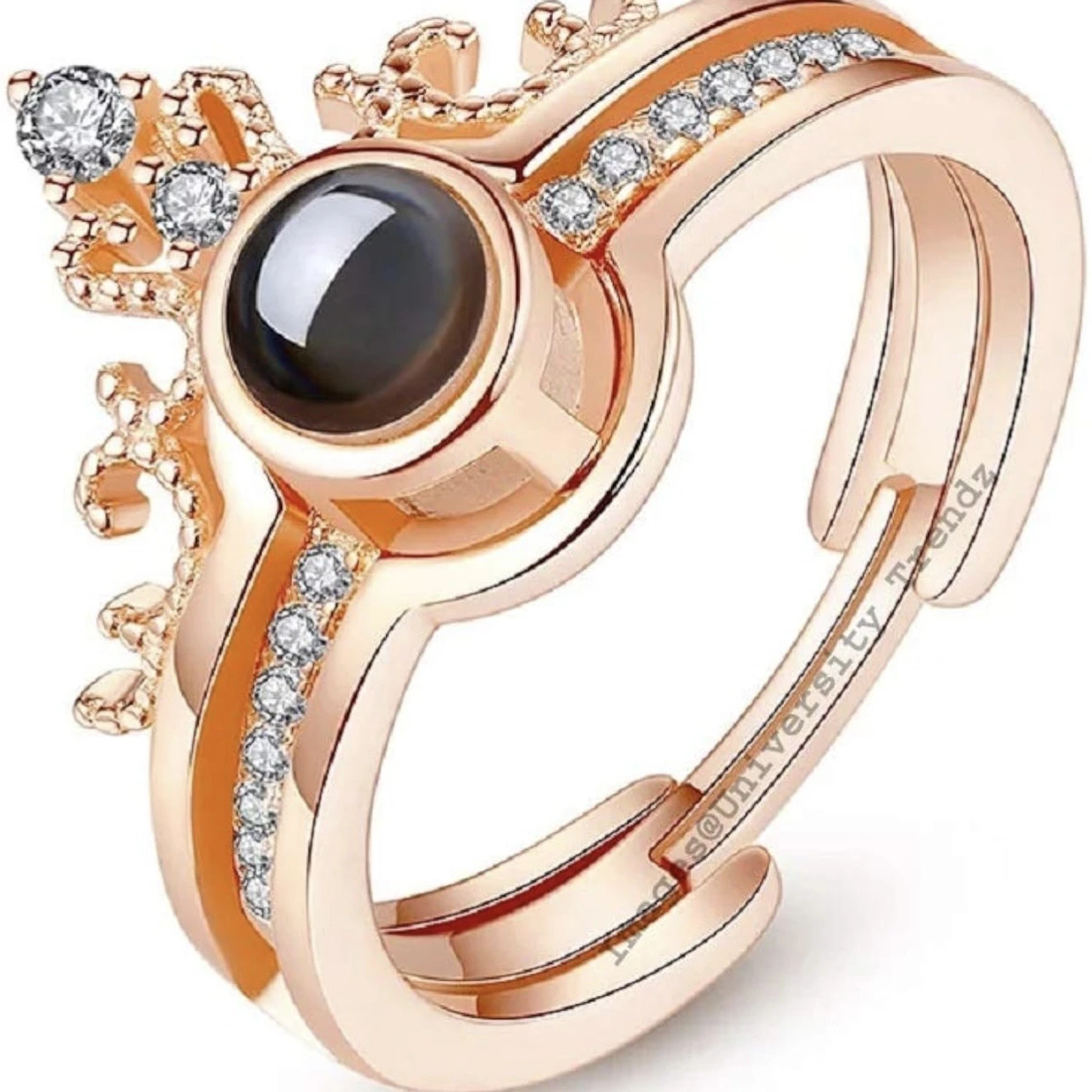crown-design "I Love You" in 100 languages projection ring, often made from a zinc alloy or artificial material.