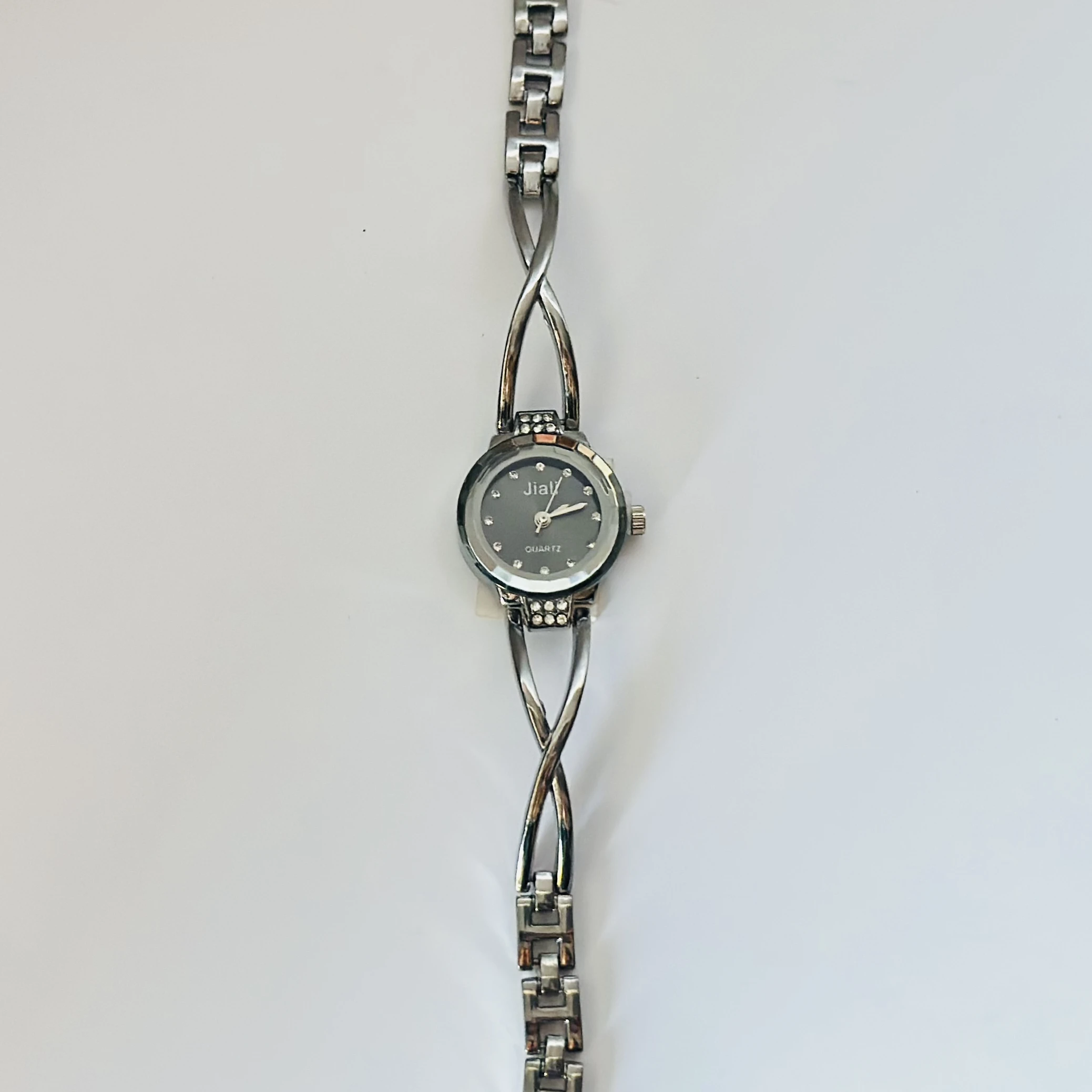 Jial quartz watch with a silver-tone twisted bracelet