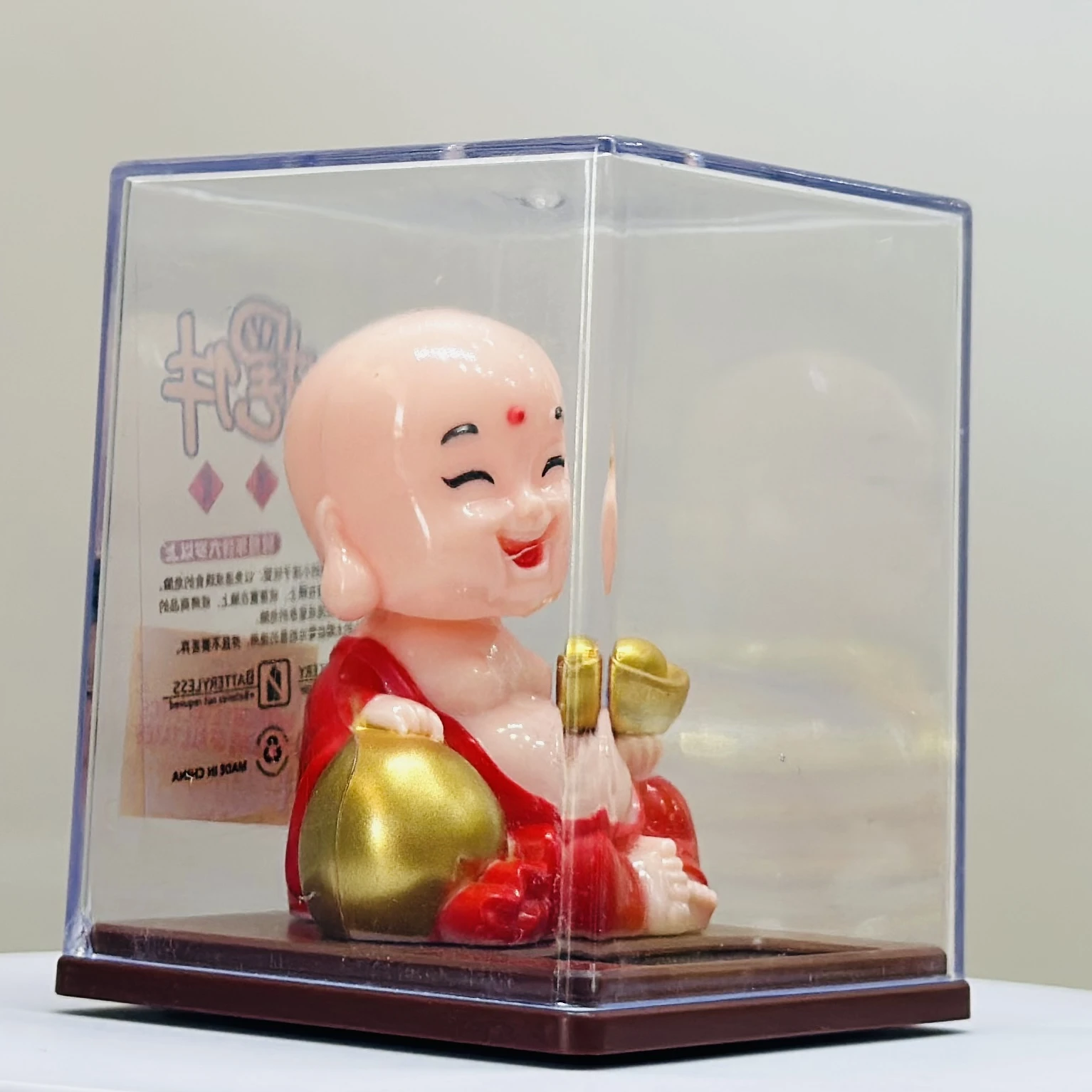 solar-powered smiley figurine