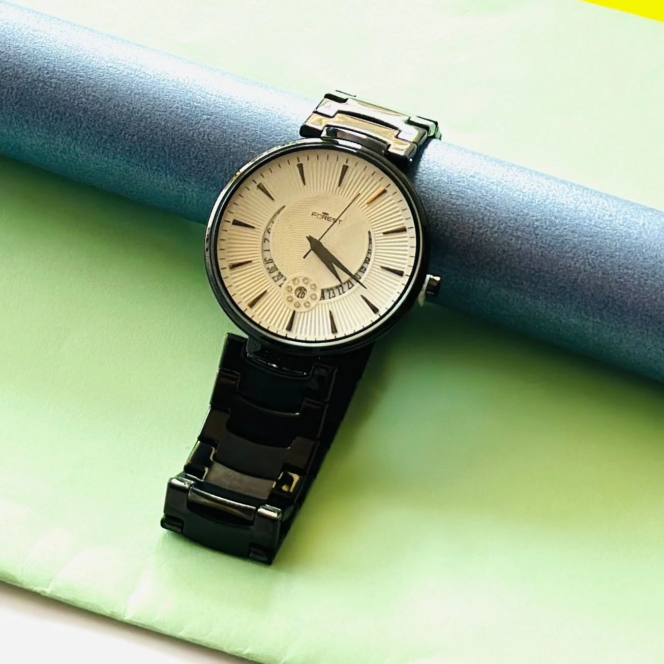 Forest Analog Watch for Men with a black metal strap.
