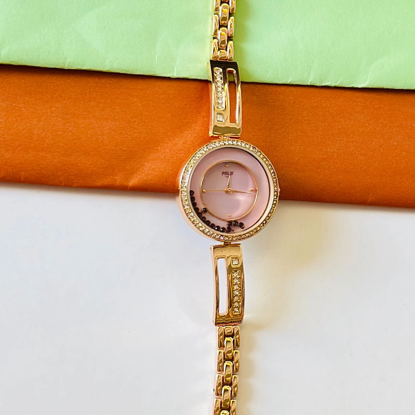 Raga Viva quartz analog watch for women with a rose gold metal strap