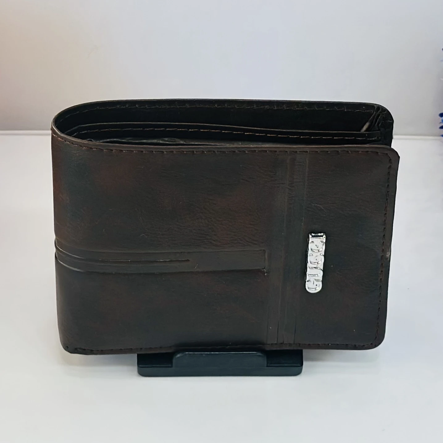 Alvis men's brown artificial leather bifold wallet.