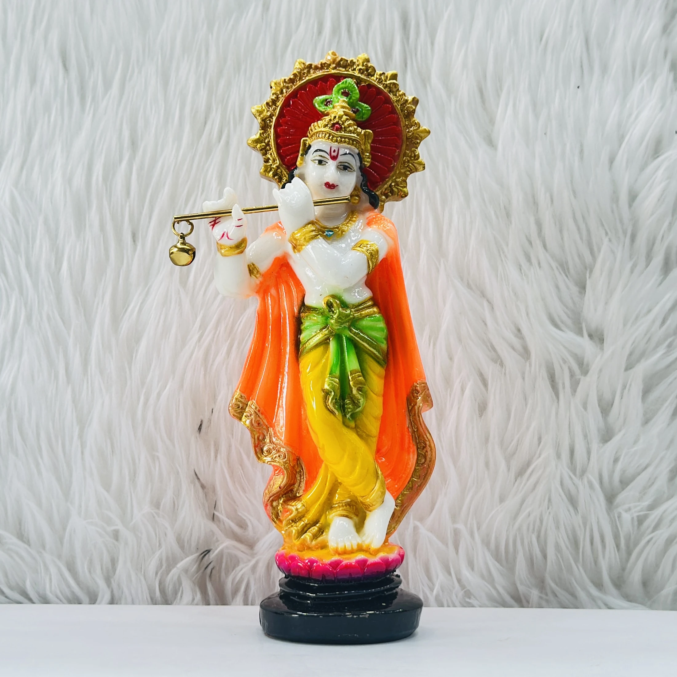 polyresin Krishna idol is a beautiful decorative showpiece