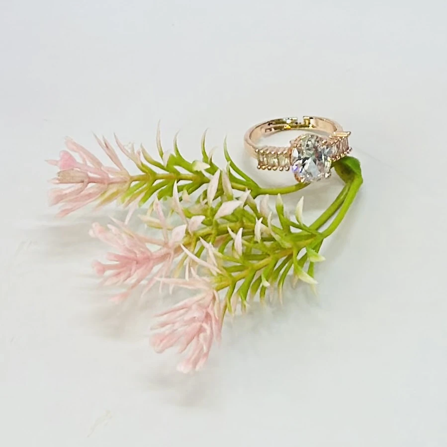 An adjustable art deco style ring