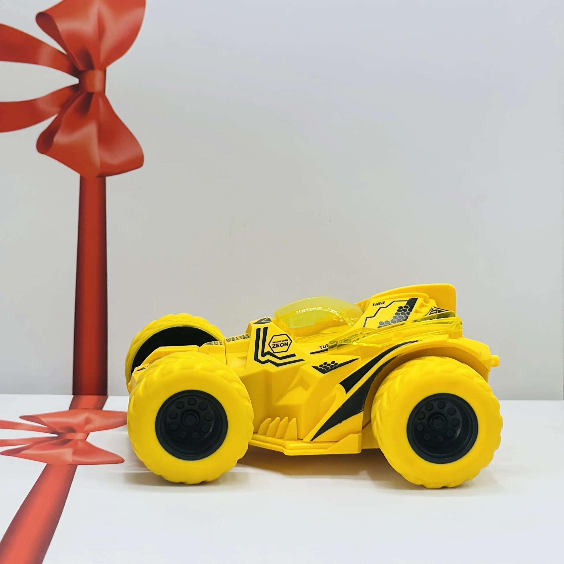 friction-powered toy stunt car