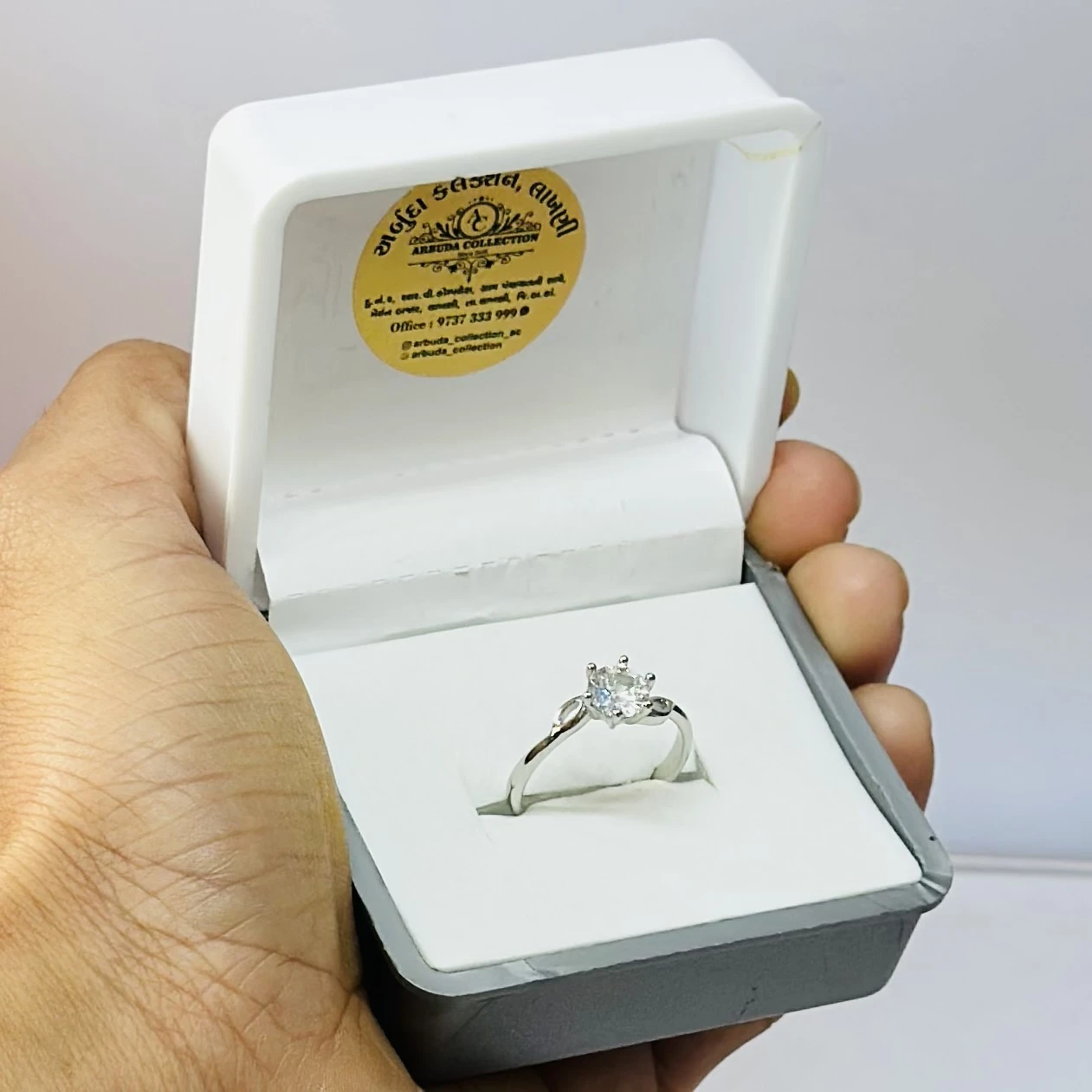 Zavya twisted solitaire rhodium plated 925 sterling silver ring.