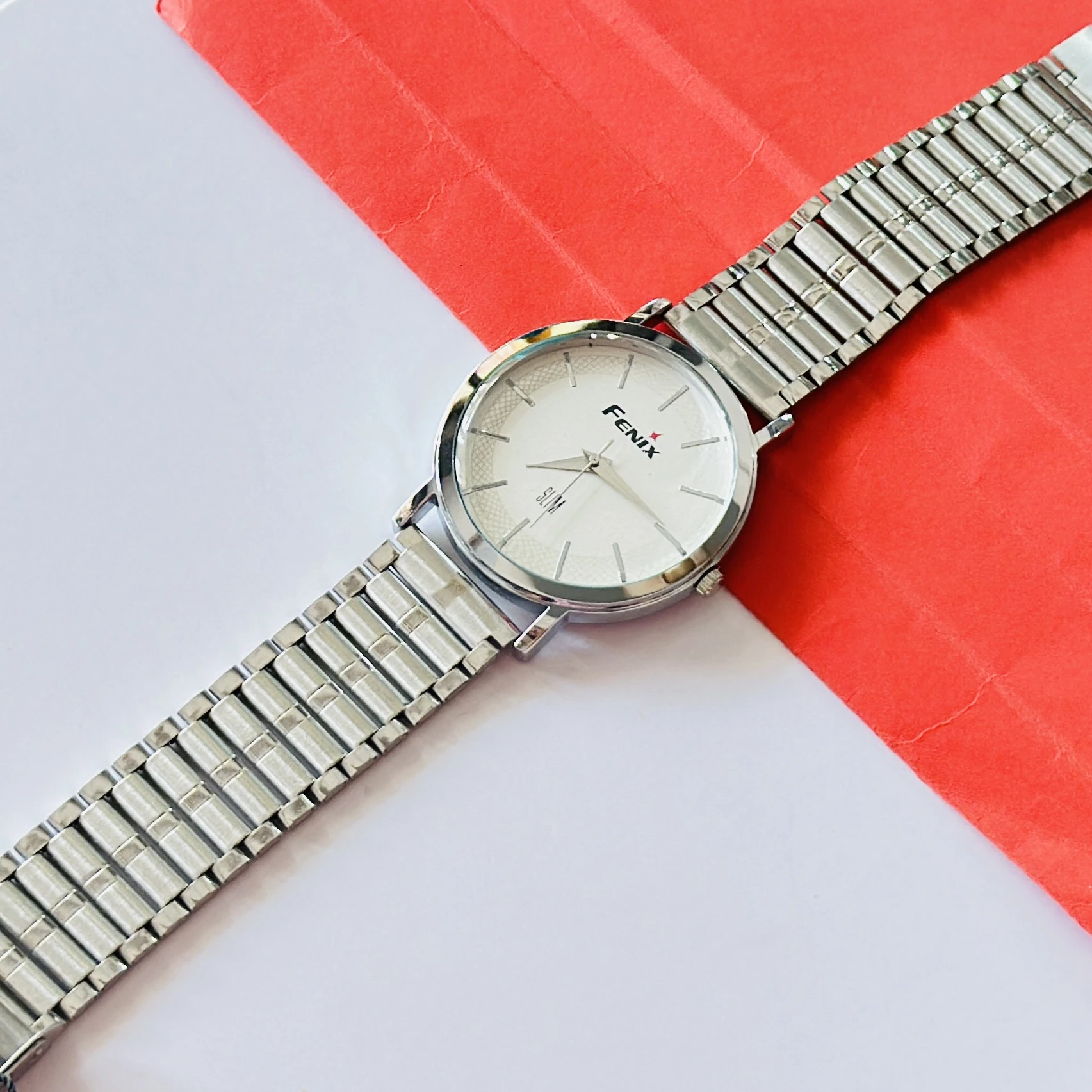 silver-toned stainless steel analogue watch