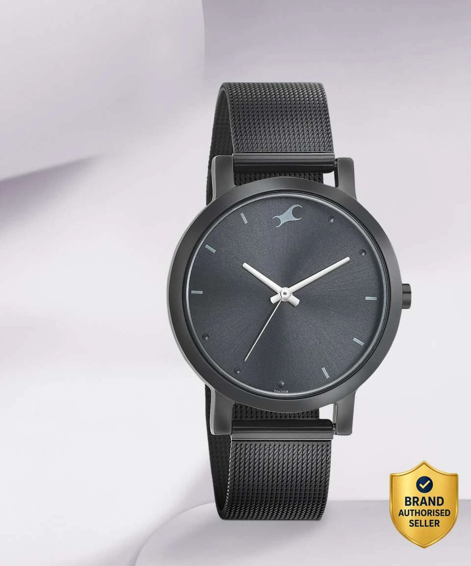Fastrack Fleek Analog Watch featuring a sleek black dial and a matching black stainless steel mesh strap.
