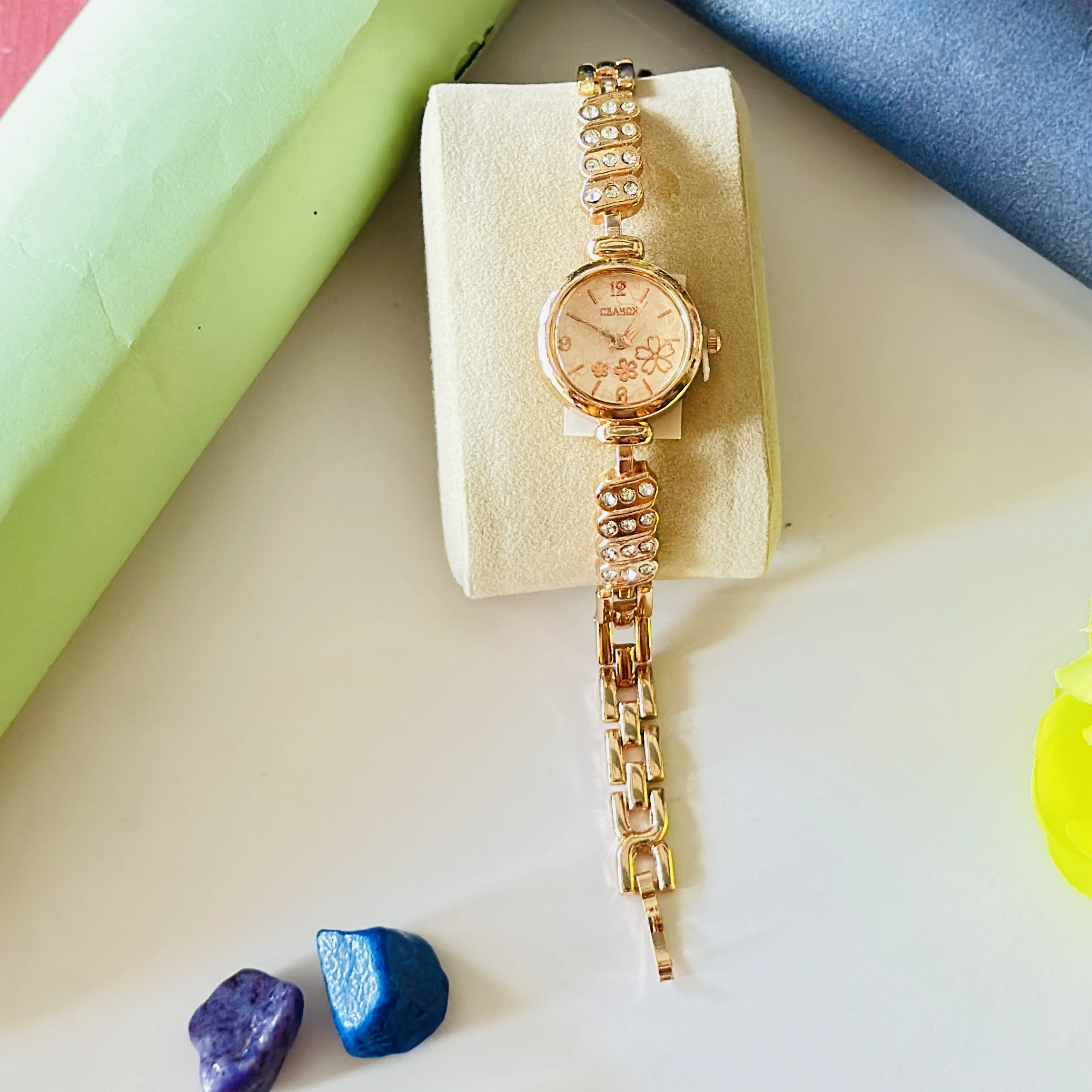 Rose gold analogue watch