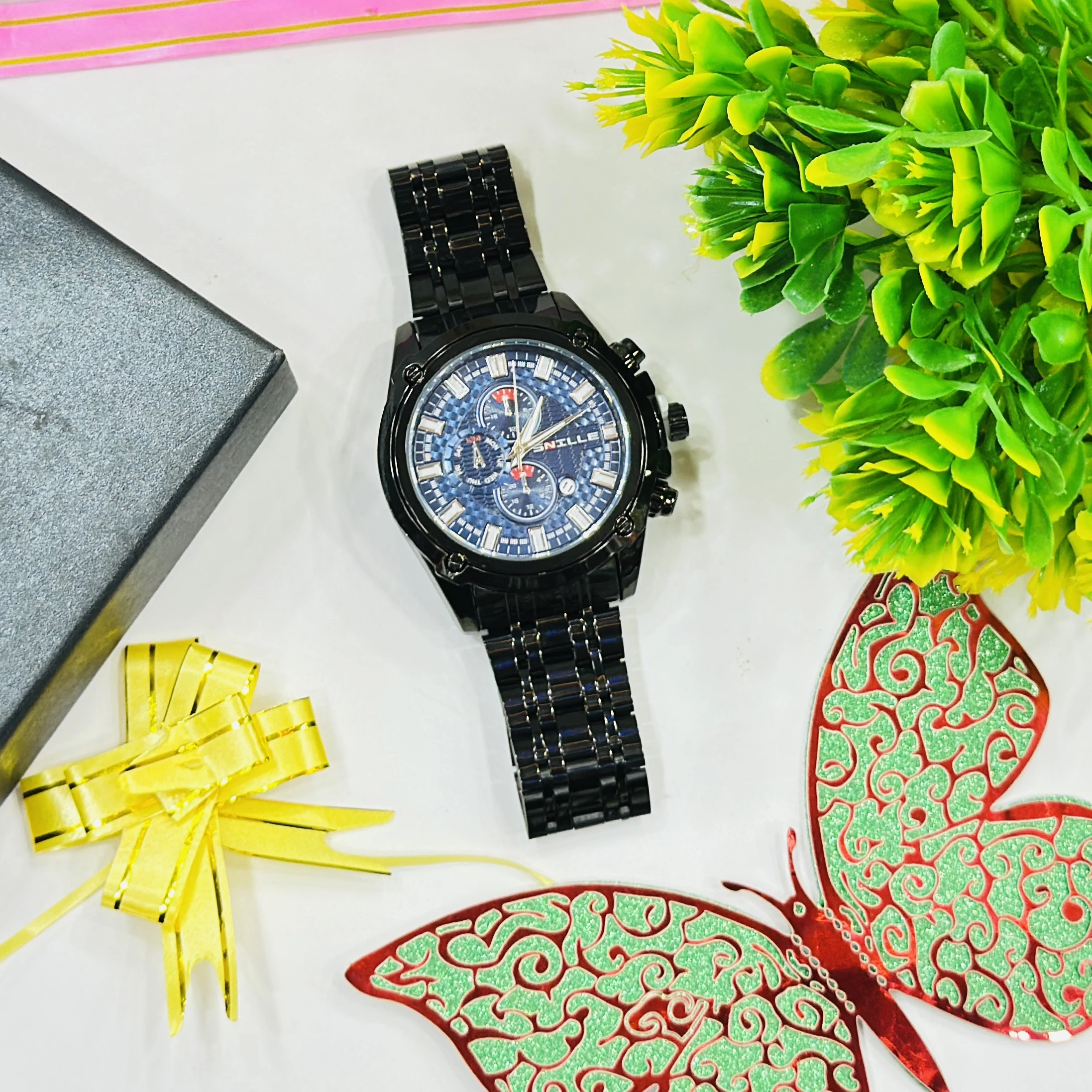 Black metal analog chronograph wristwatch