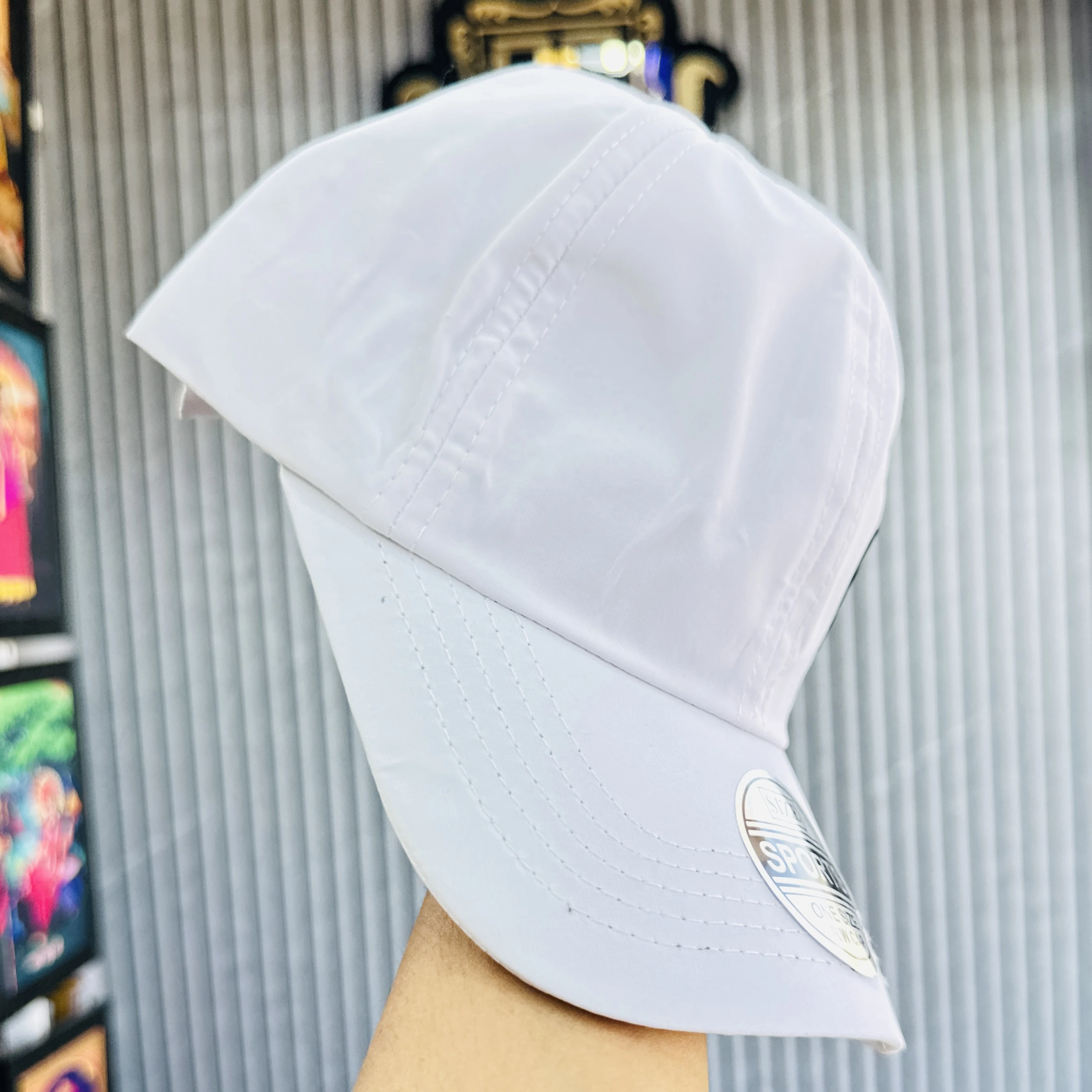 appears to be a white Nike branded baseball cap