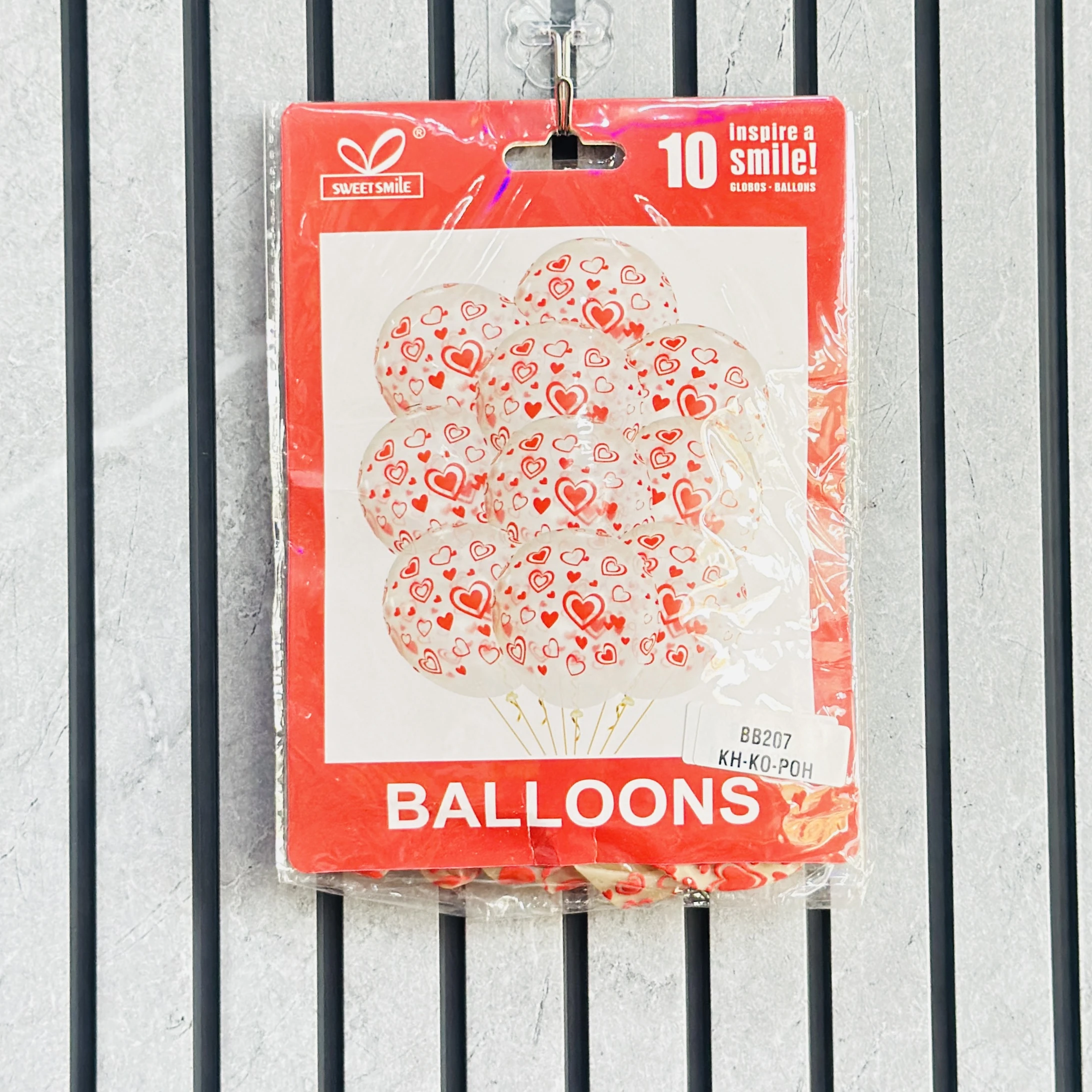 Sweet Smile brand balloon pack with heart prints.