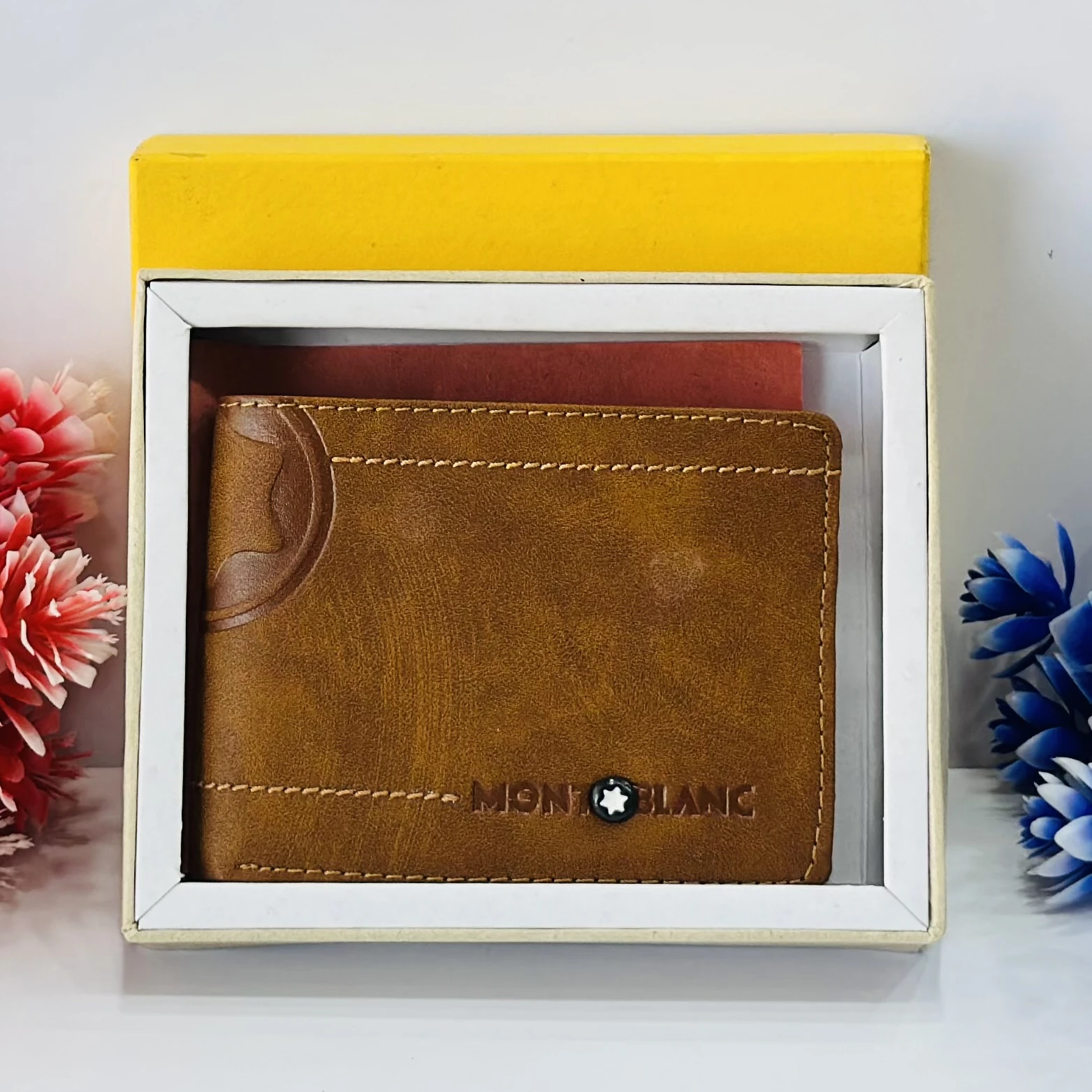Brown bifold leather wallet in a Montblanc gift box.