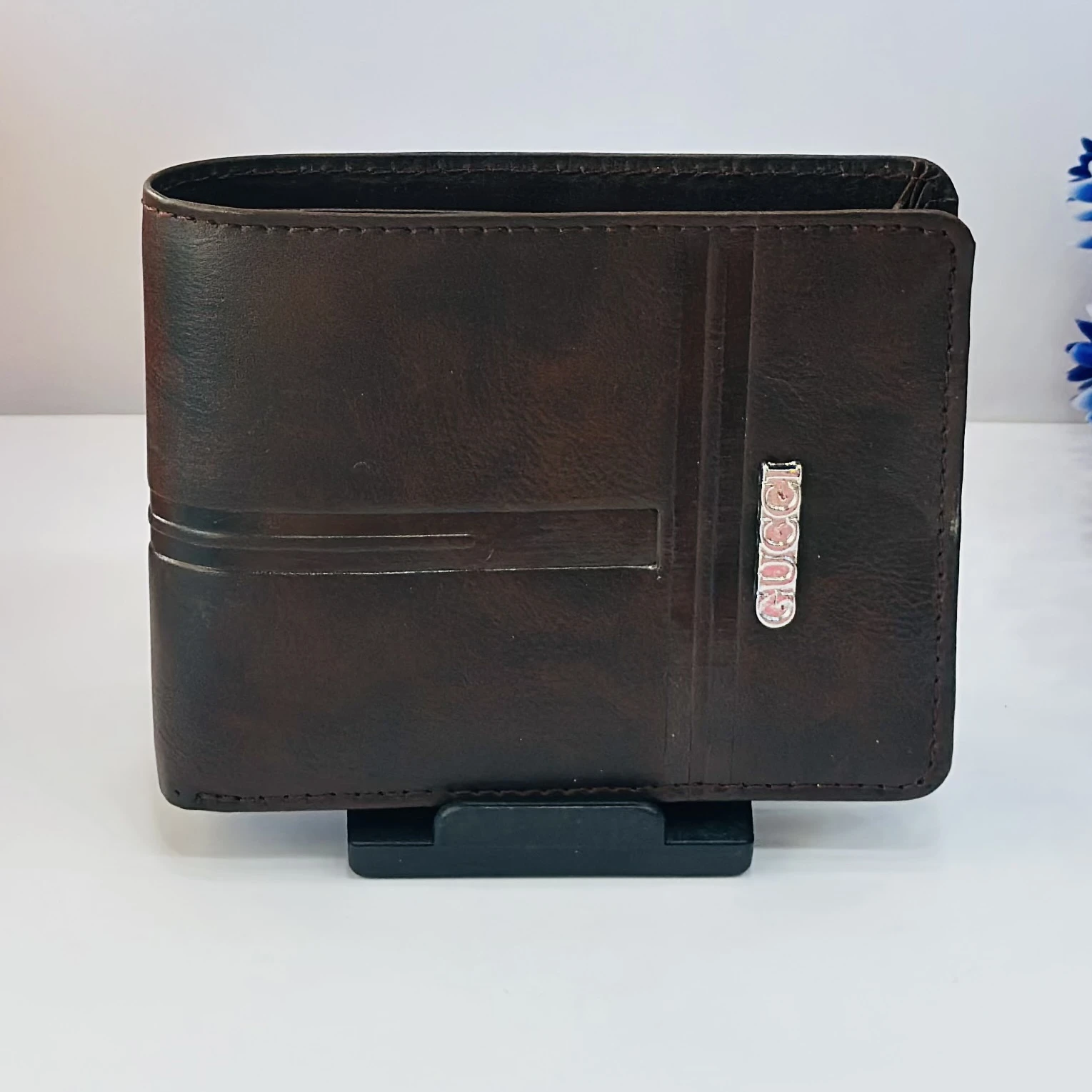Alvis men's brown artificial leather bifold wallet.
