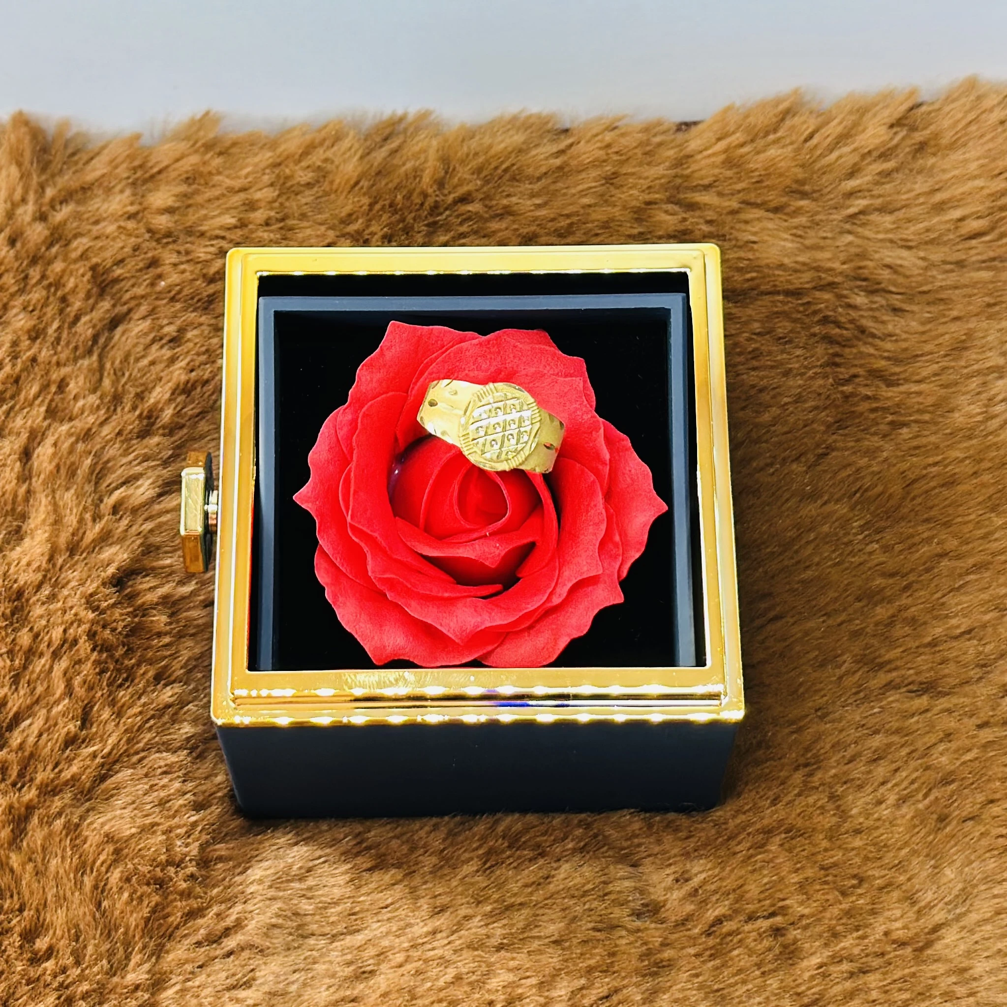 Hallmark gold ring for men displayed in a presentation box.