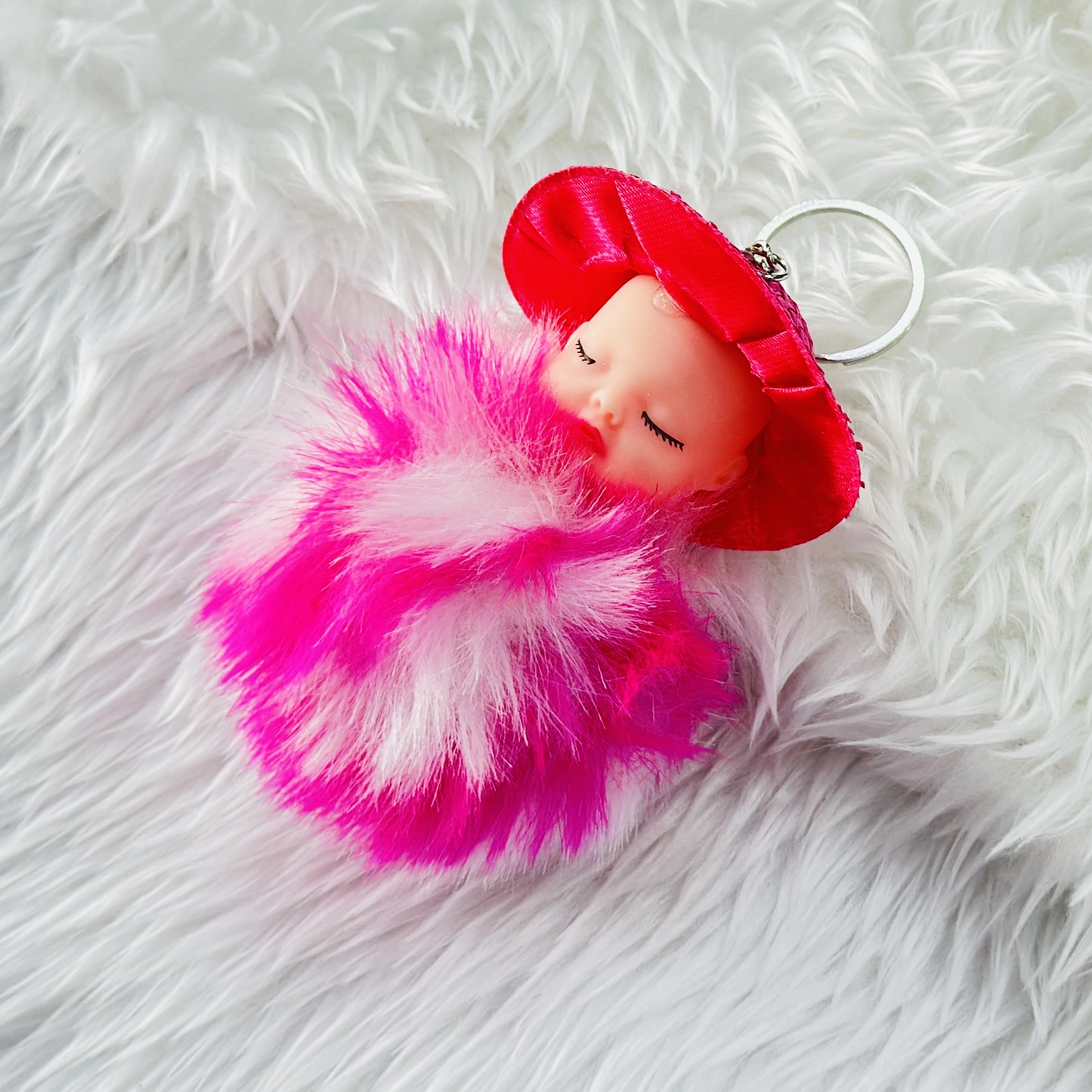 fluffy sleeping baby doll keychain
