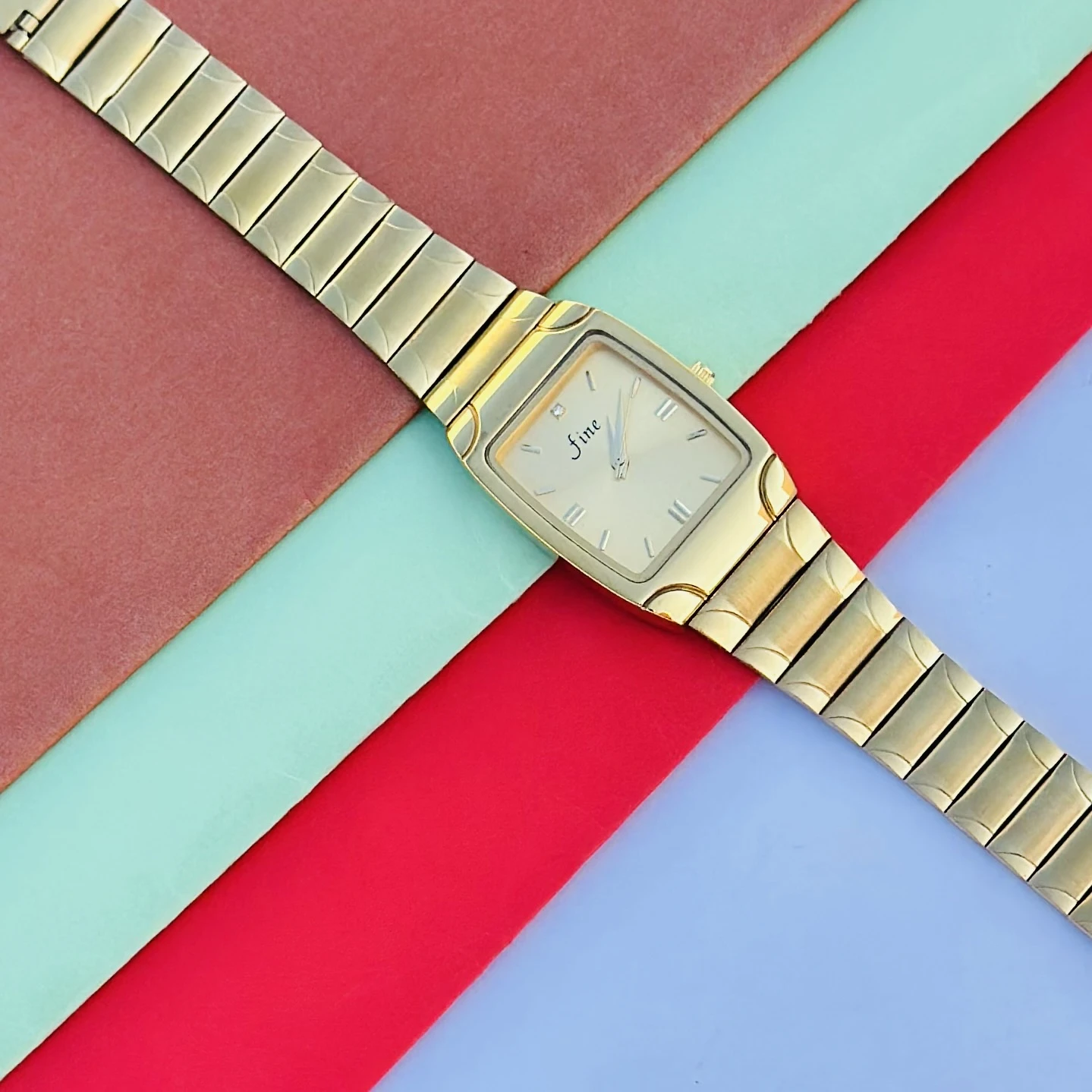 Gold tone analog wrist watch