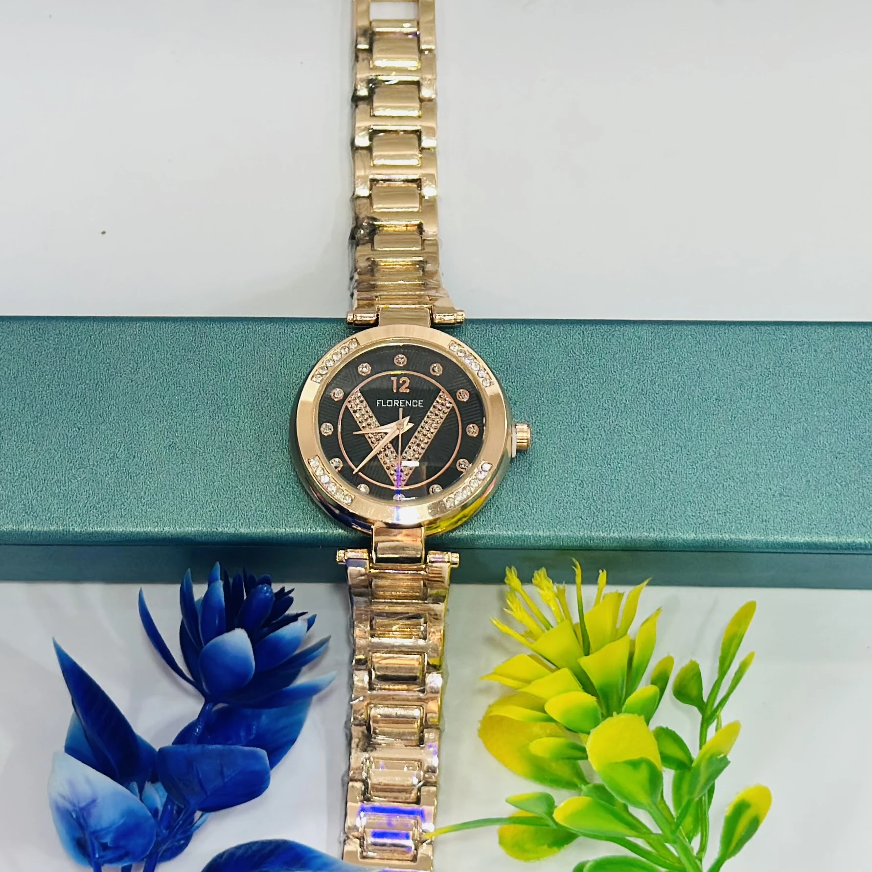 Analogue Women's Wrist Watch in rose gold color.
