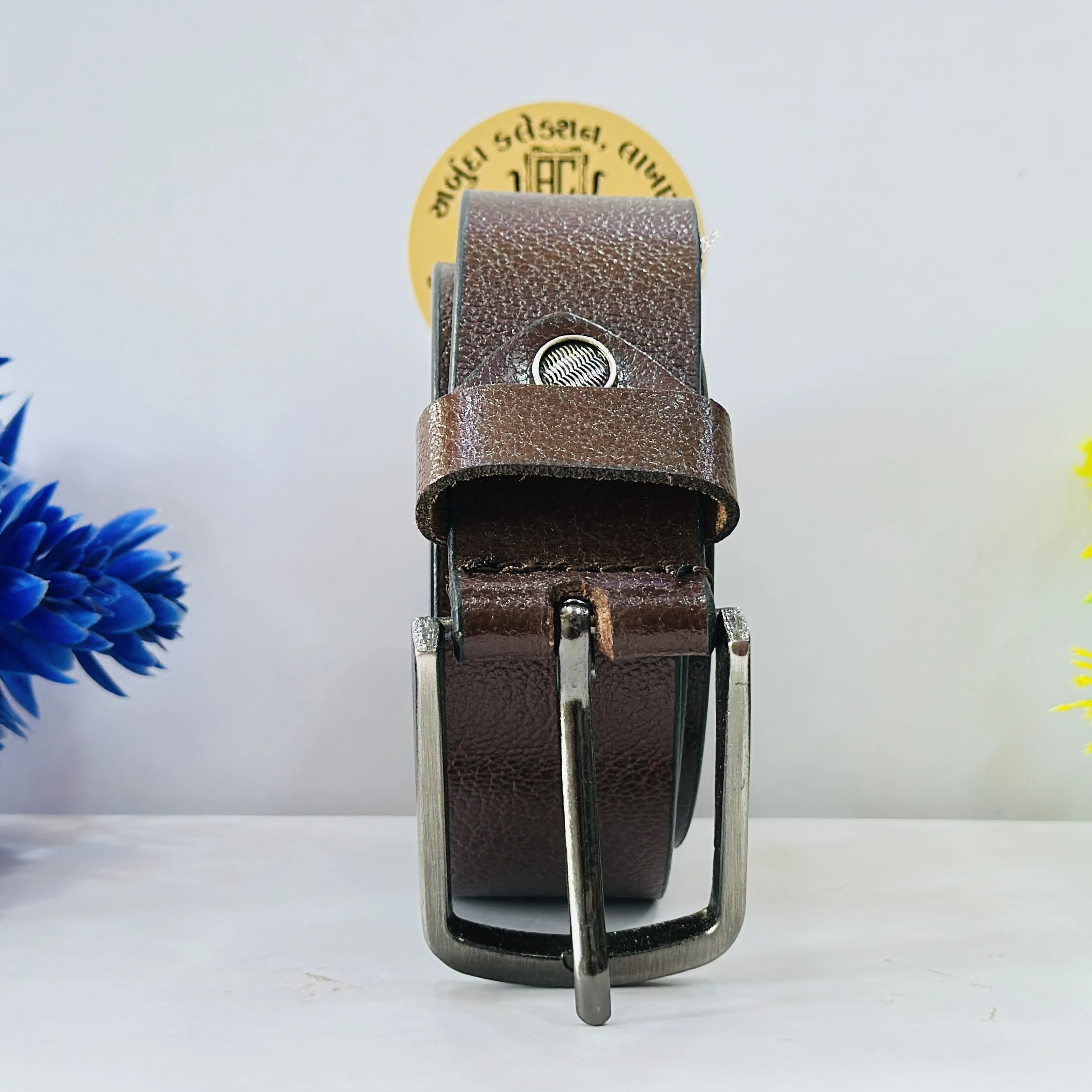 branded belt is a brown, textured men's formal leather