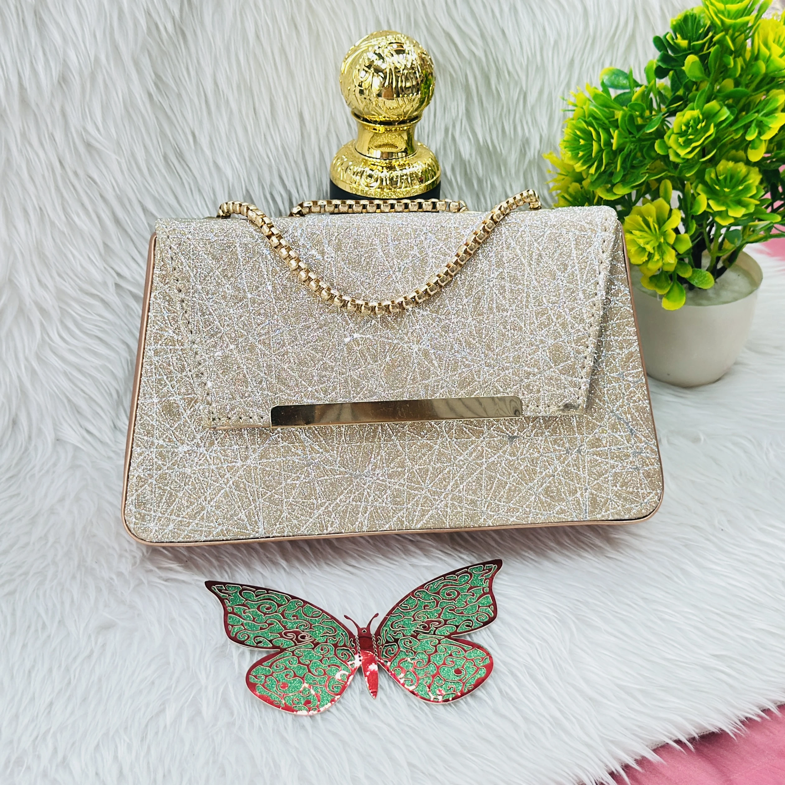 Gold glitter evening clutch or sling bag