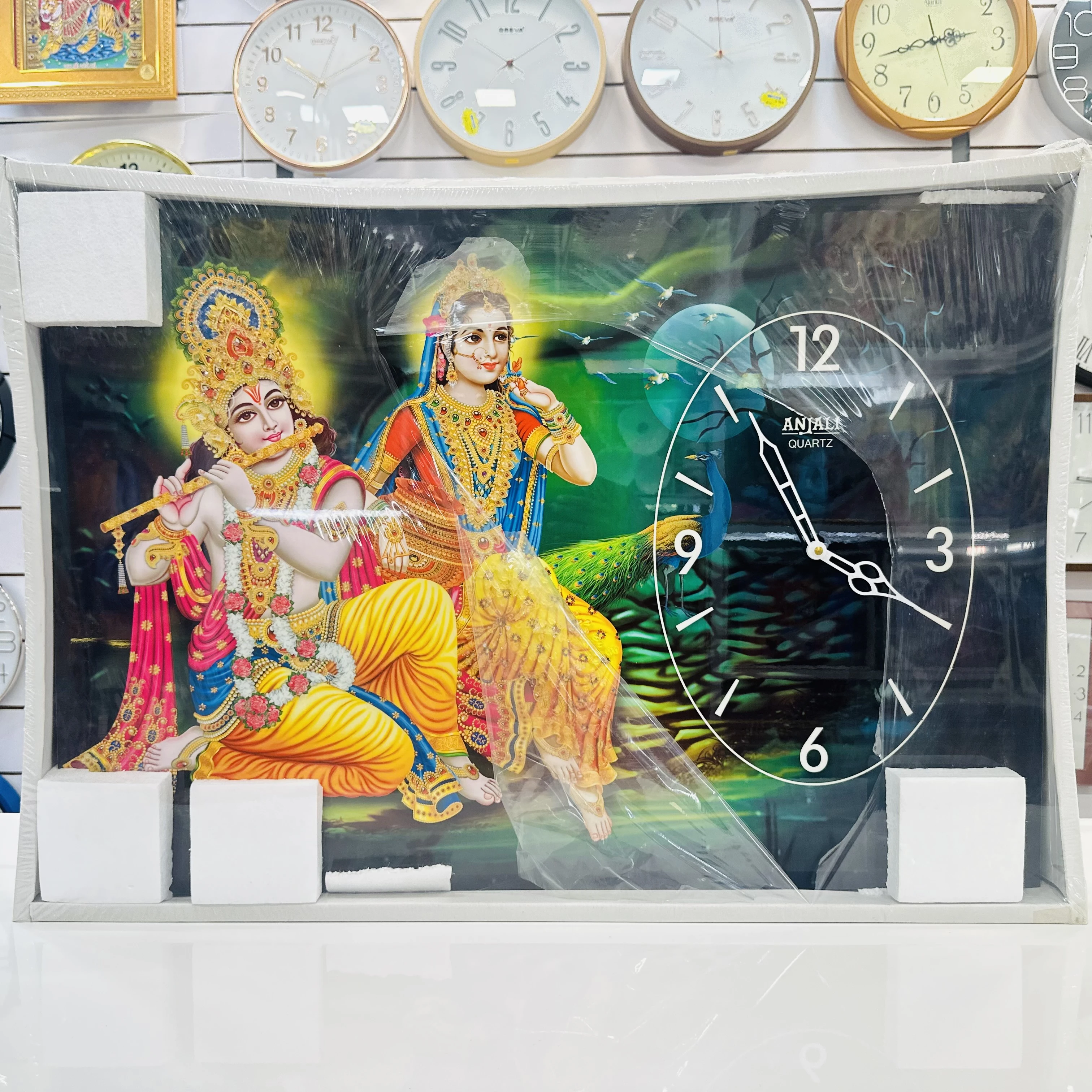 Radhe Krishna-themed wall clock(SKU-IJZPPI)