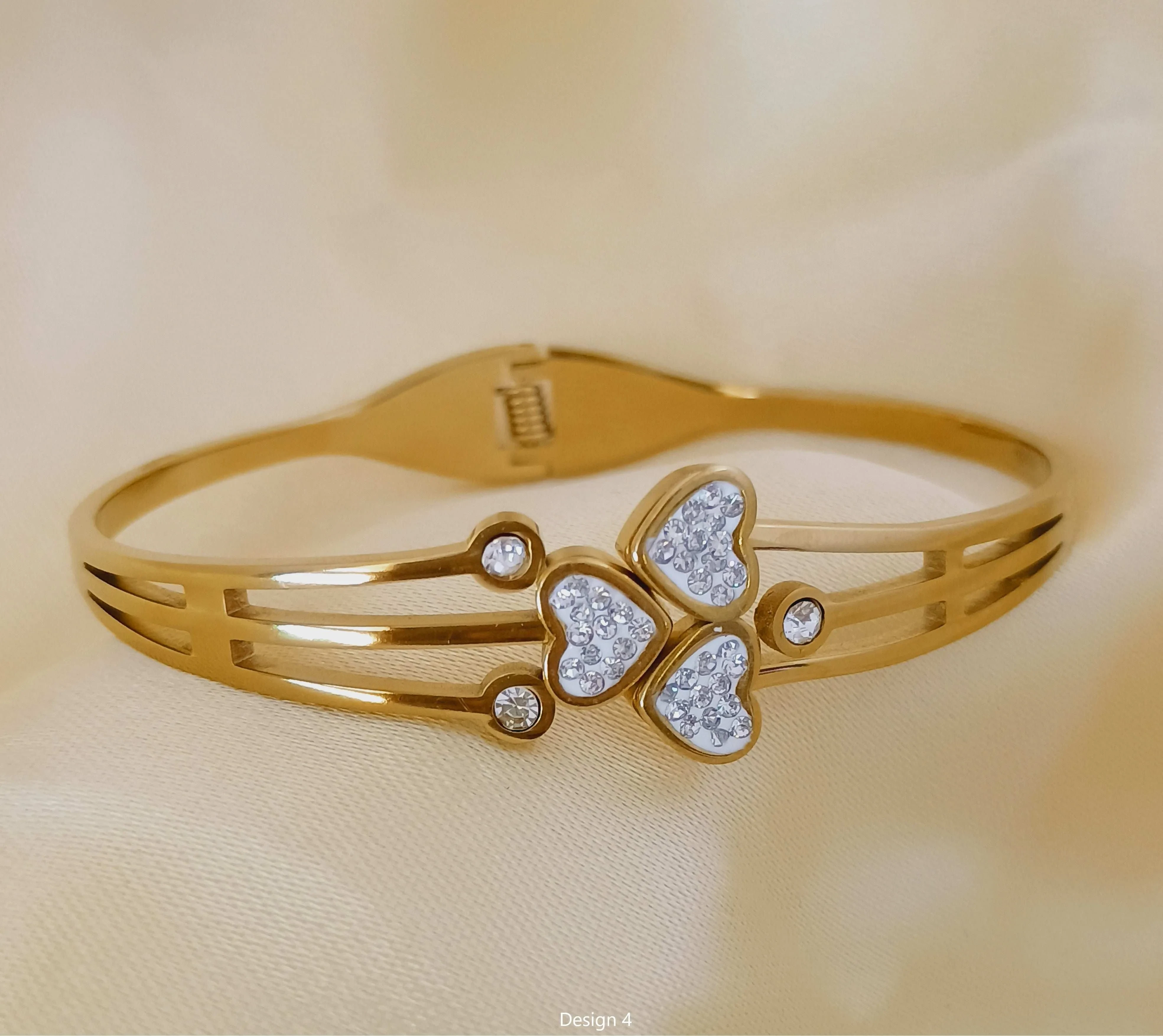 Gold plated stainless steel bangle-style bracelet