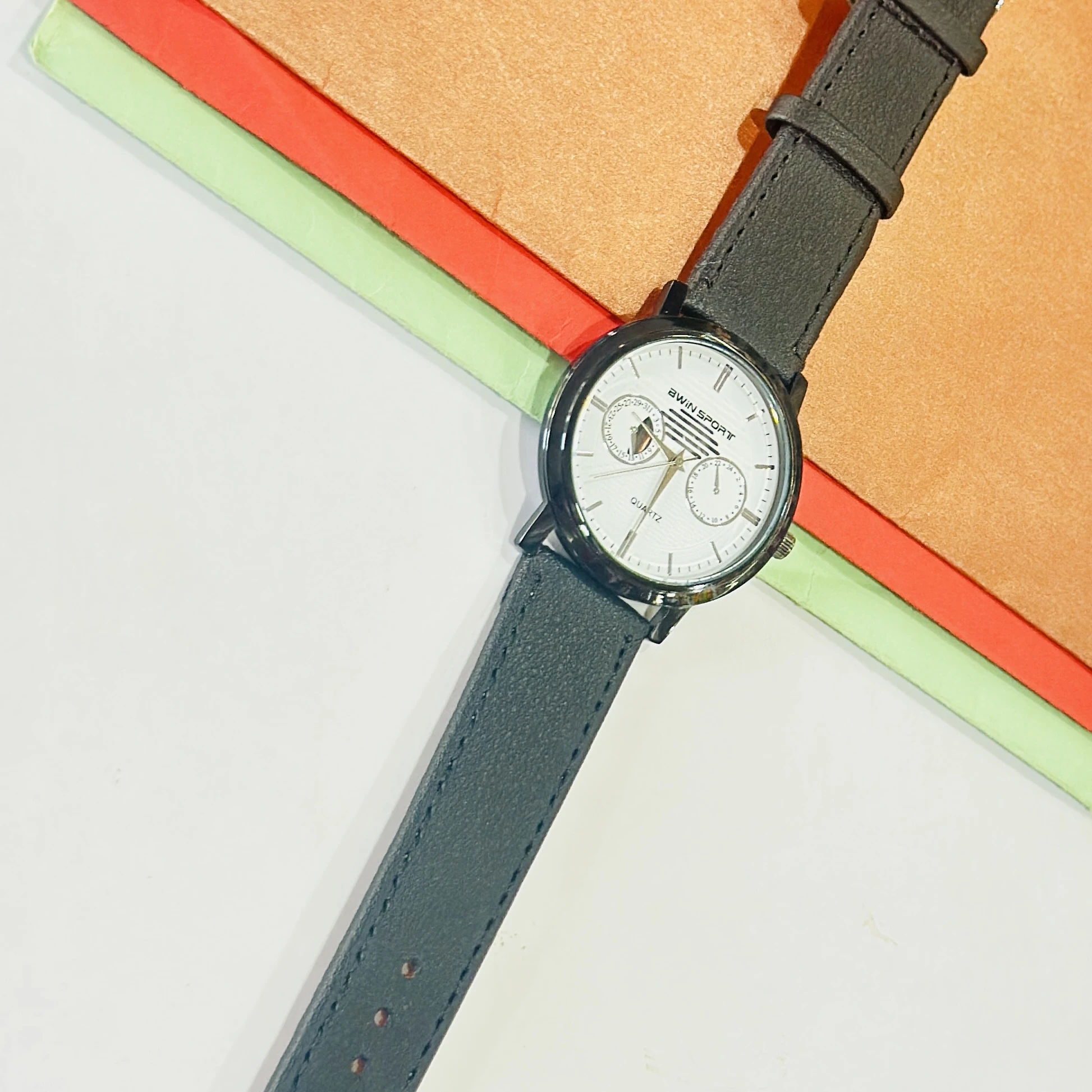 watch is a BWIN brand analog watch