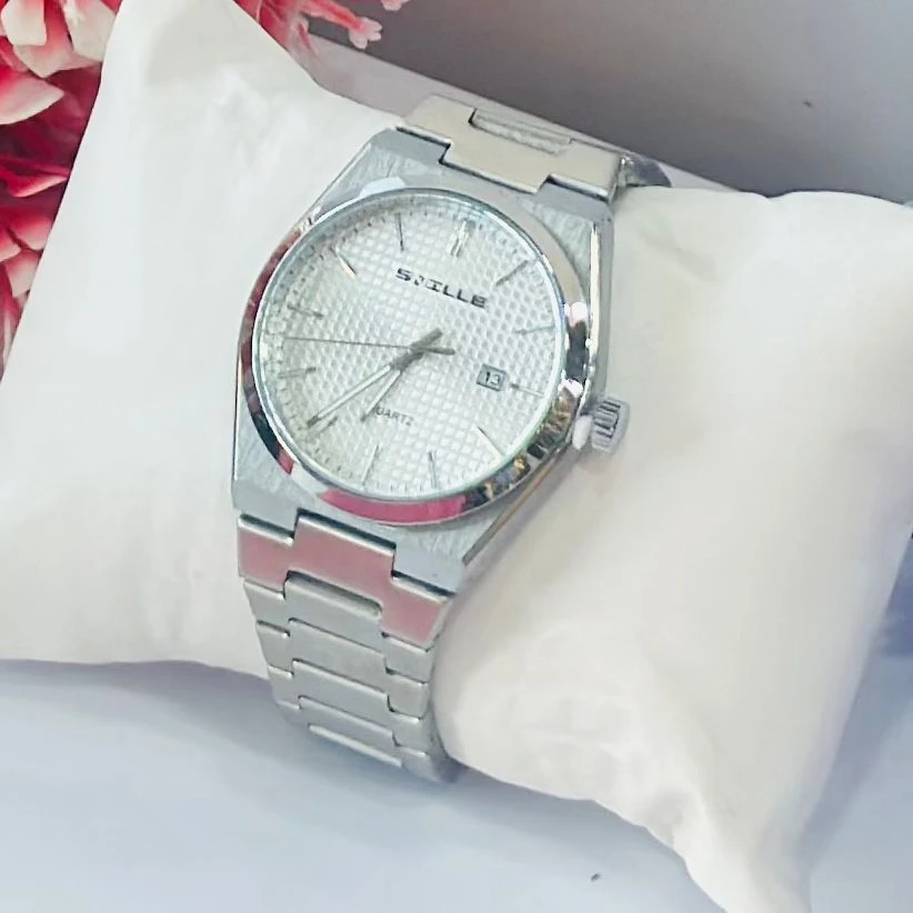 analog watch with a white dial and date function.