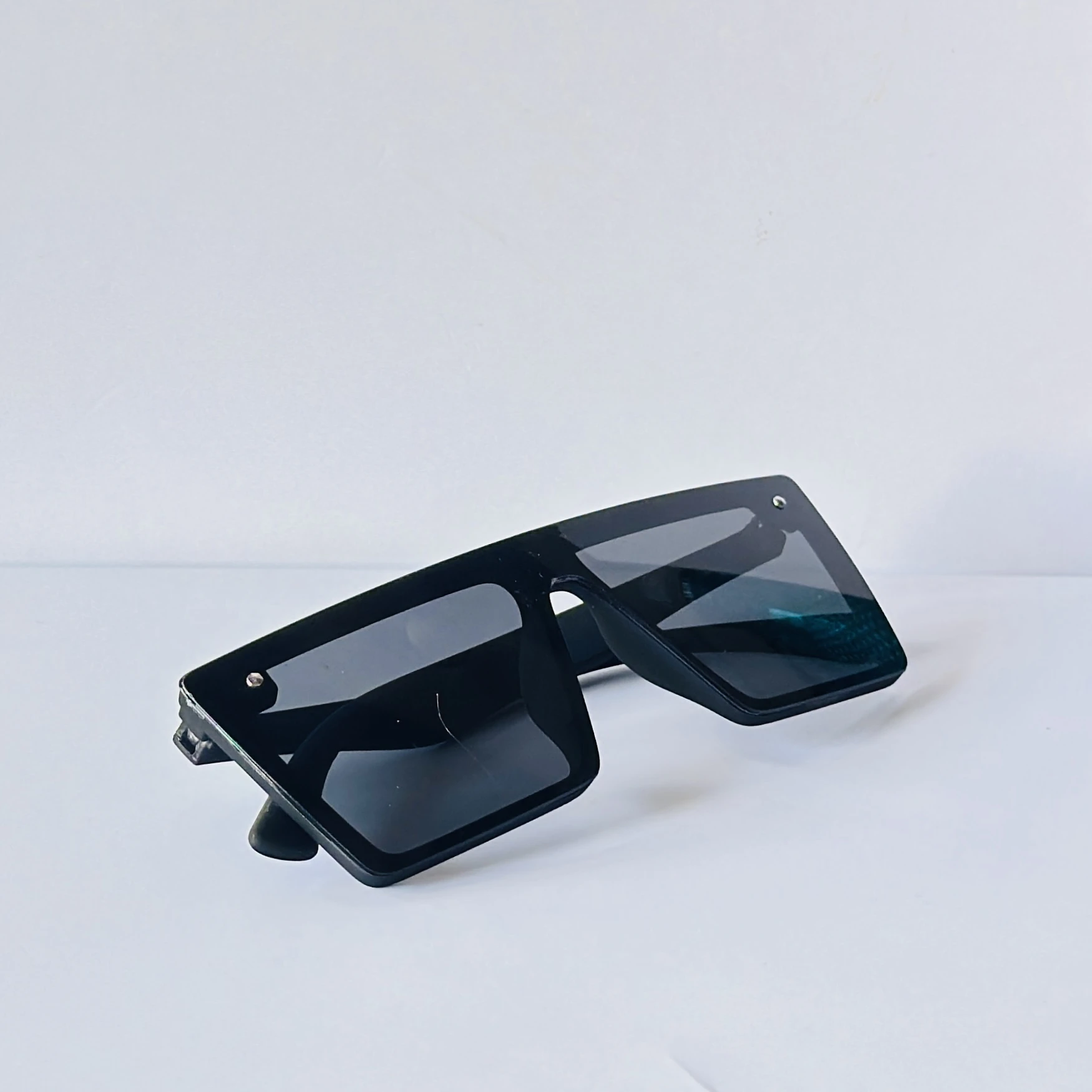 Black sunglasses are a retro square