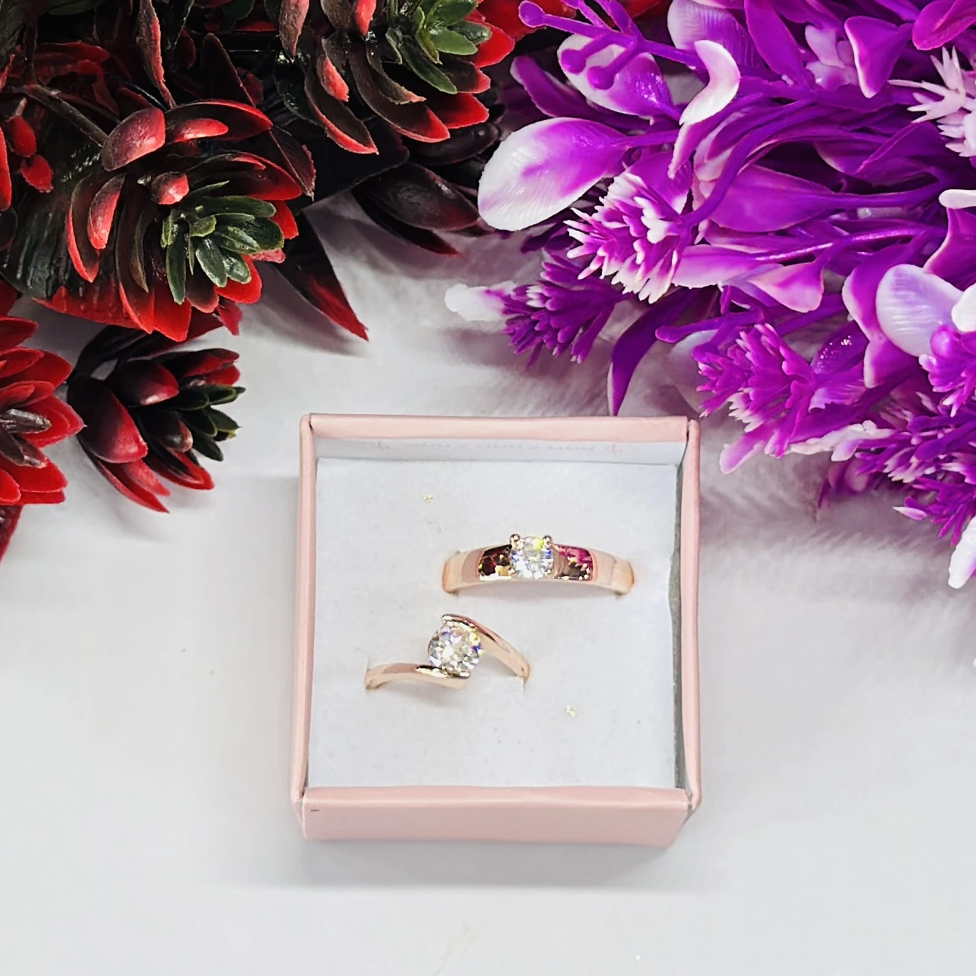 rose gold-plated cubic zirconia couple rings.
