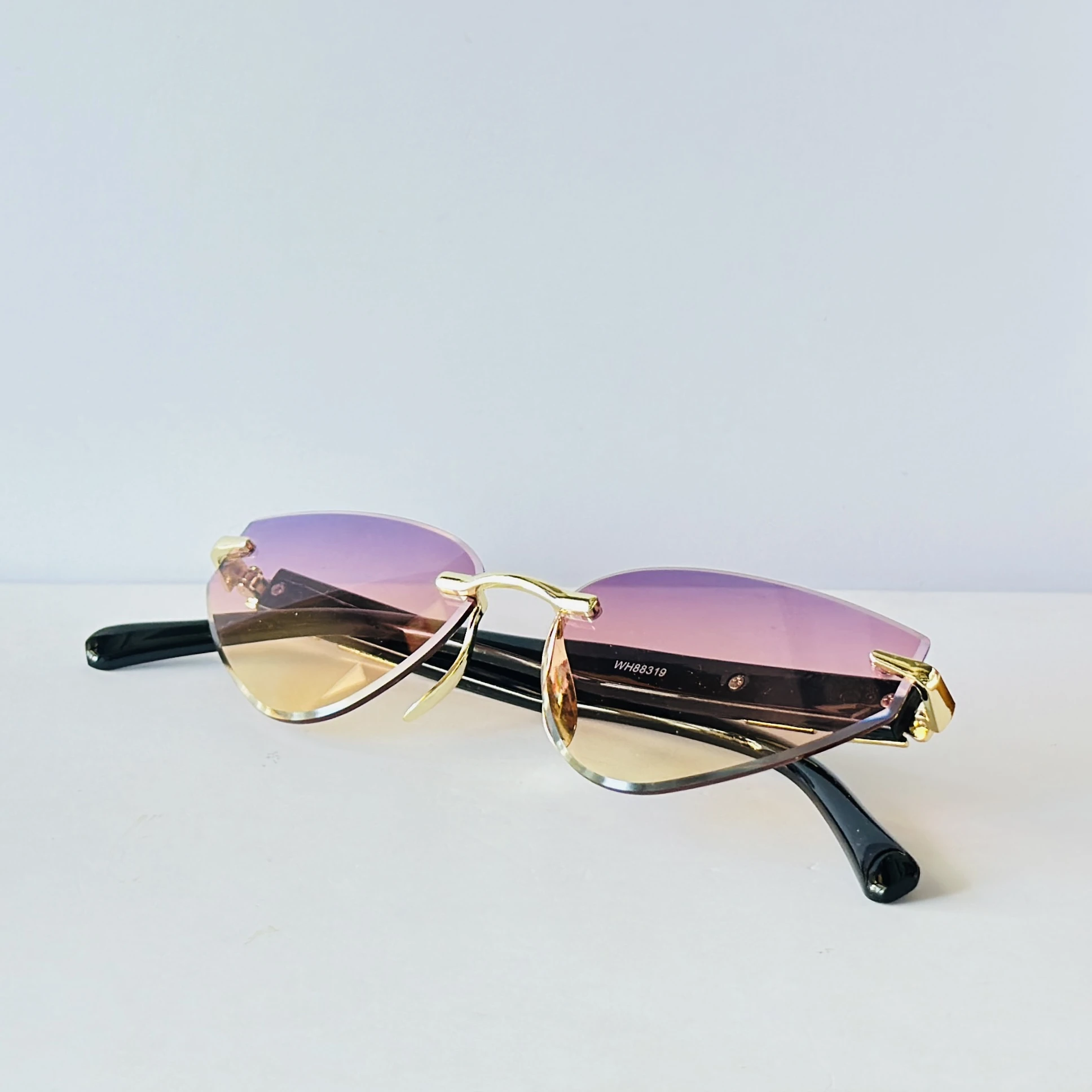 Rimless cat-eye sunglasses