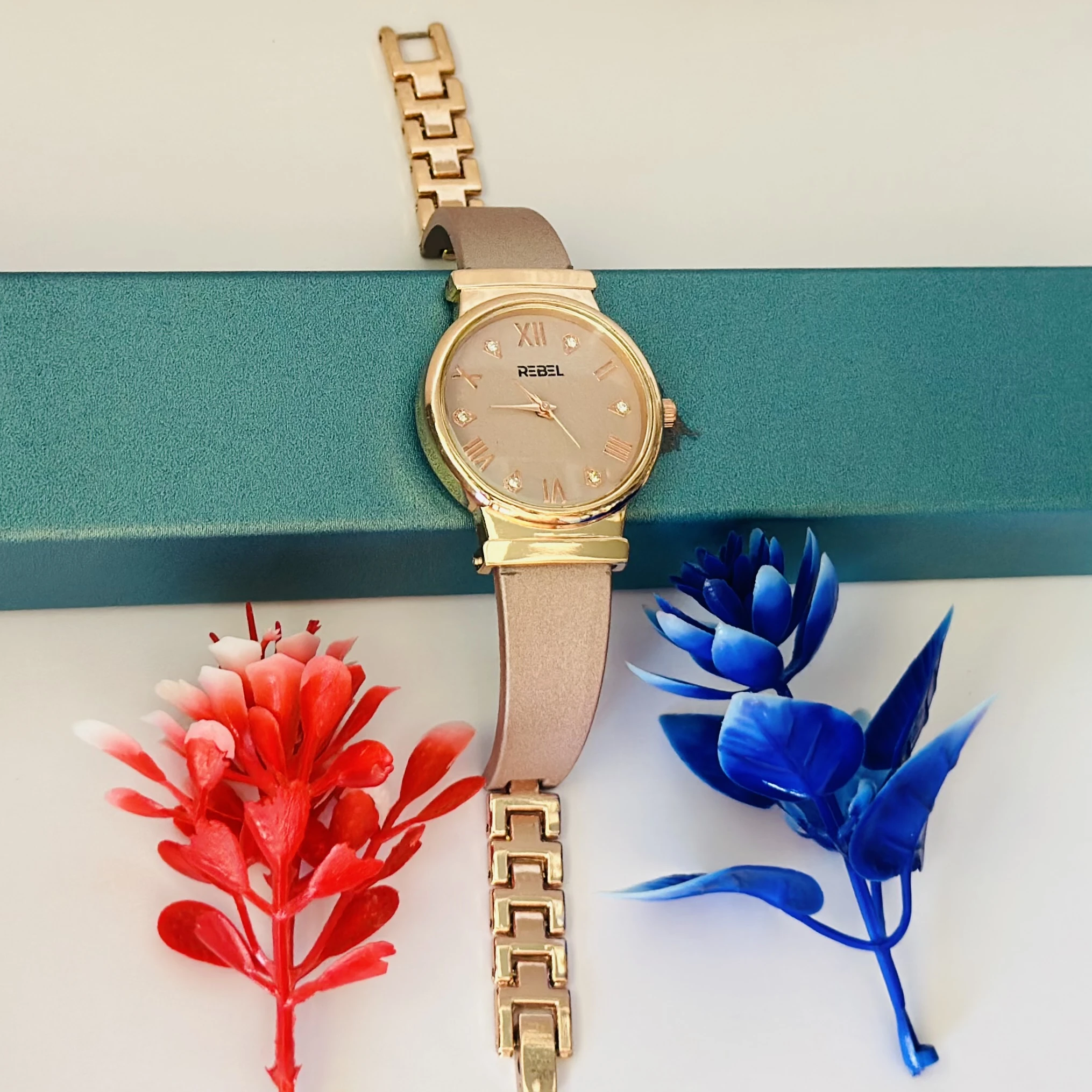 Rose gold analog watch