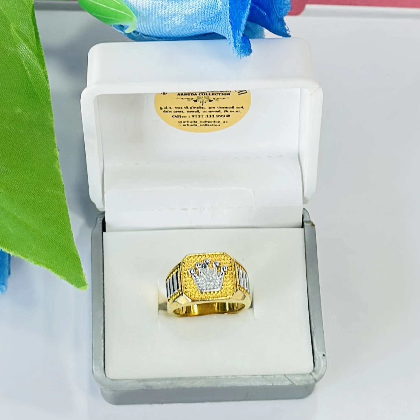 Gold toned men's crown ring