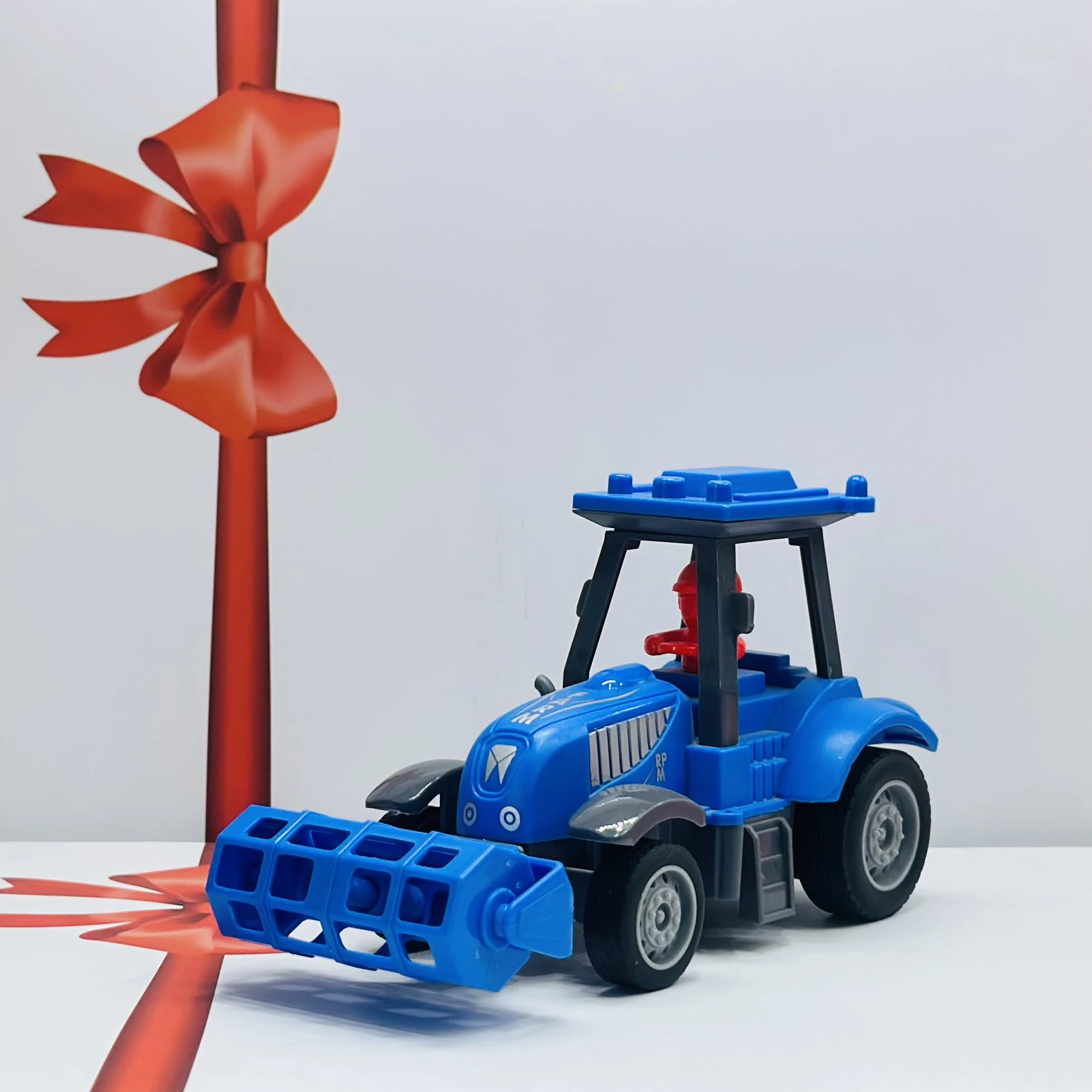 Blue plastic toy tractor