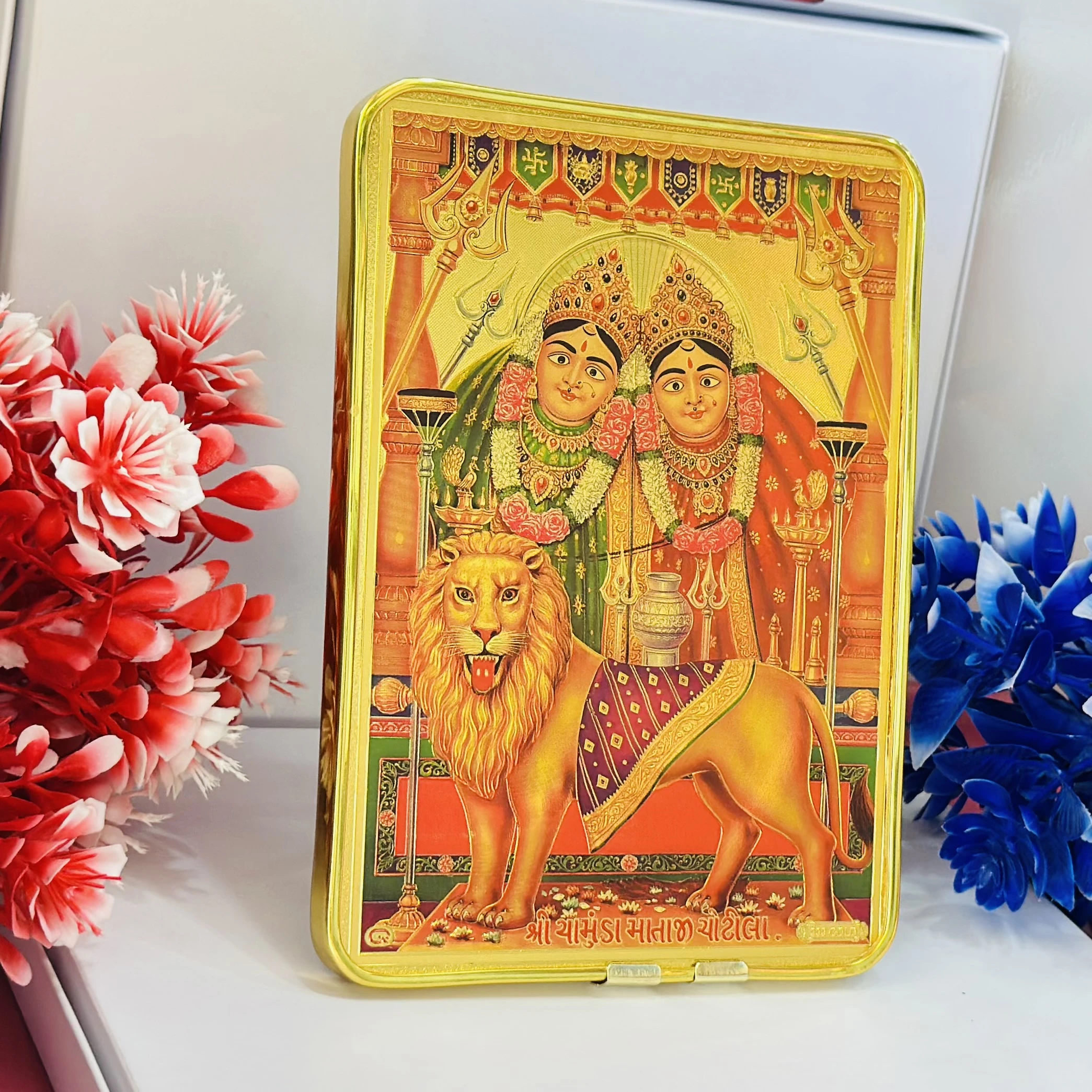 Golden foil photo frame of Shri Chamunda Mataji.