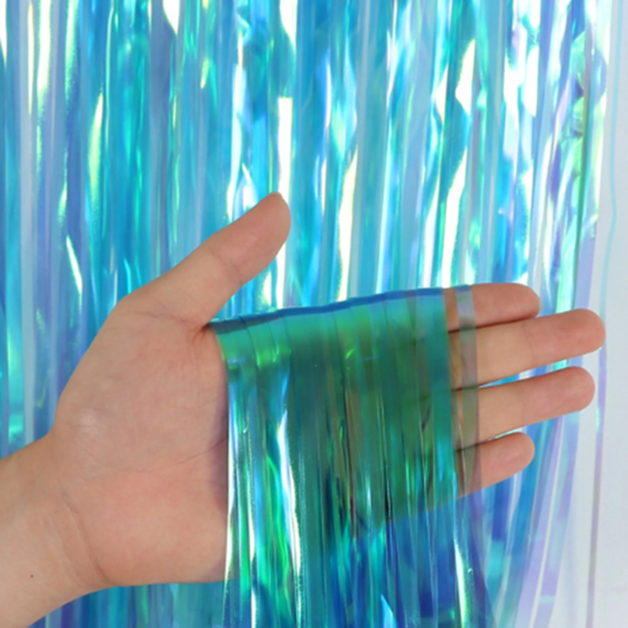 PartyPal iridescent blue metallic foil fringe curtain decoration