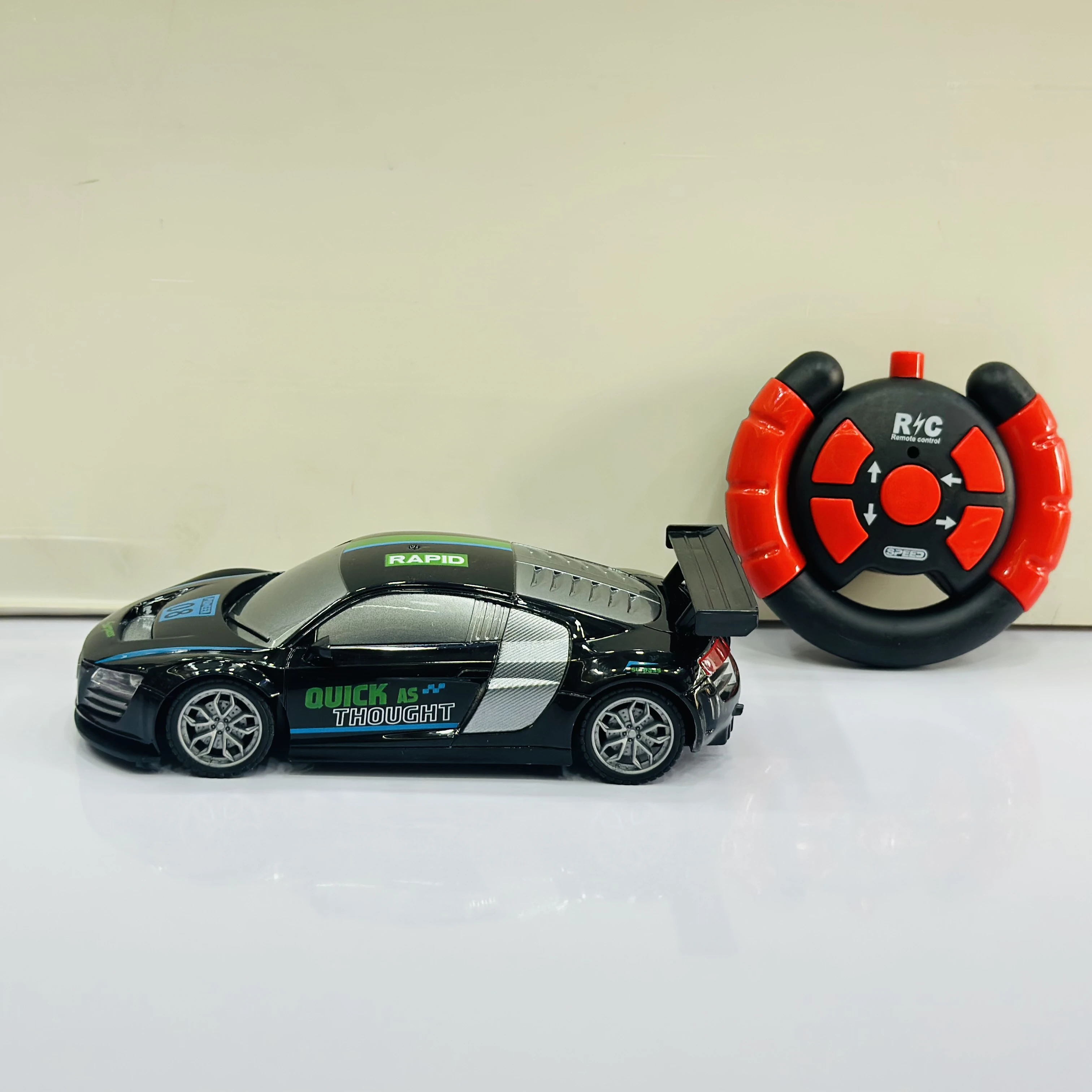 Firerace Championship" 1:18 scale remote-control (R/C) toy car.