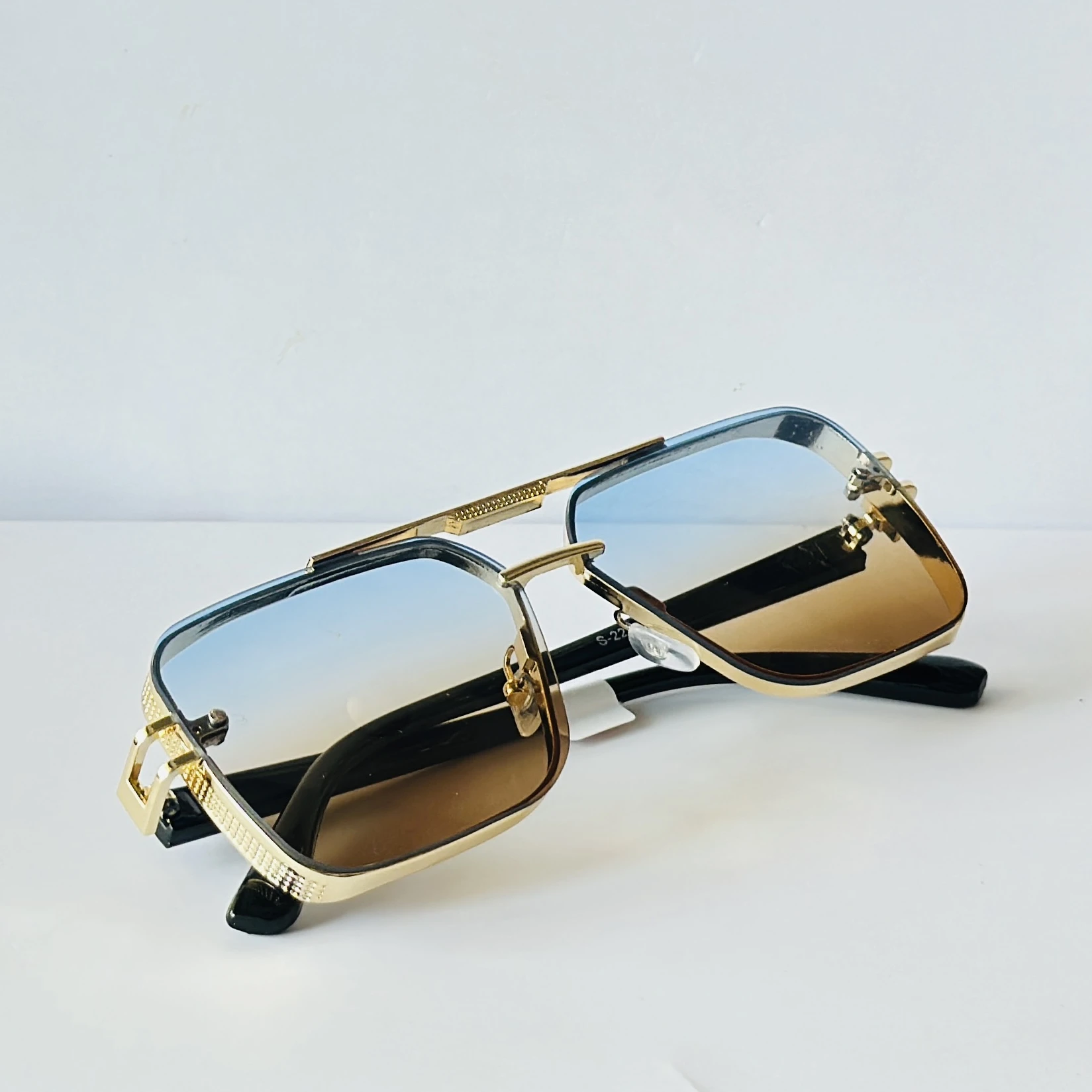 sunglasses feature a square frame
