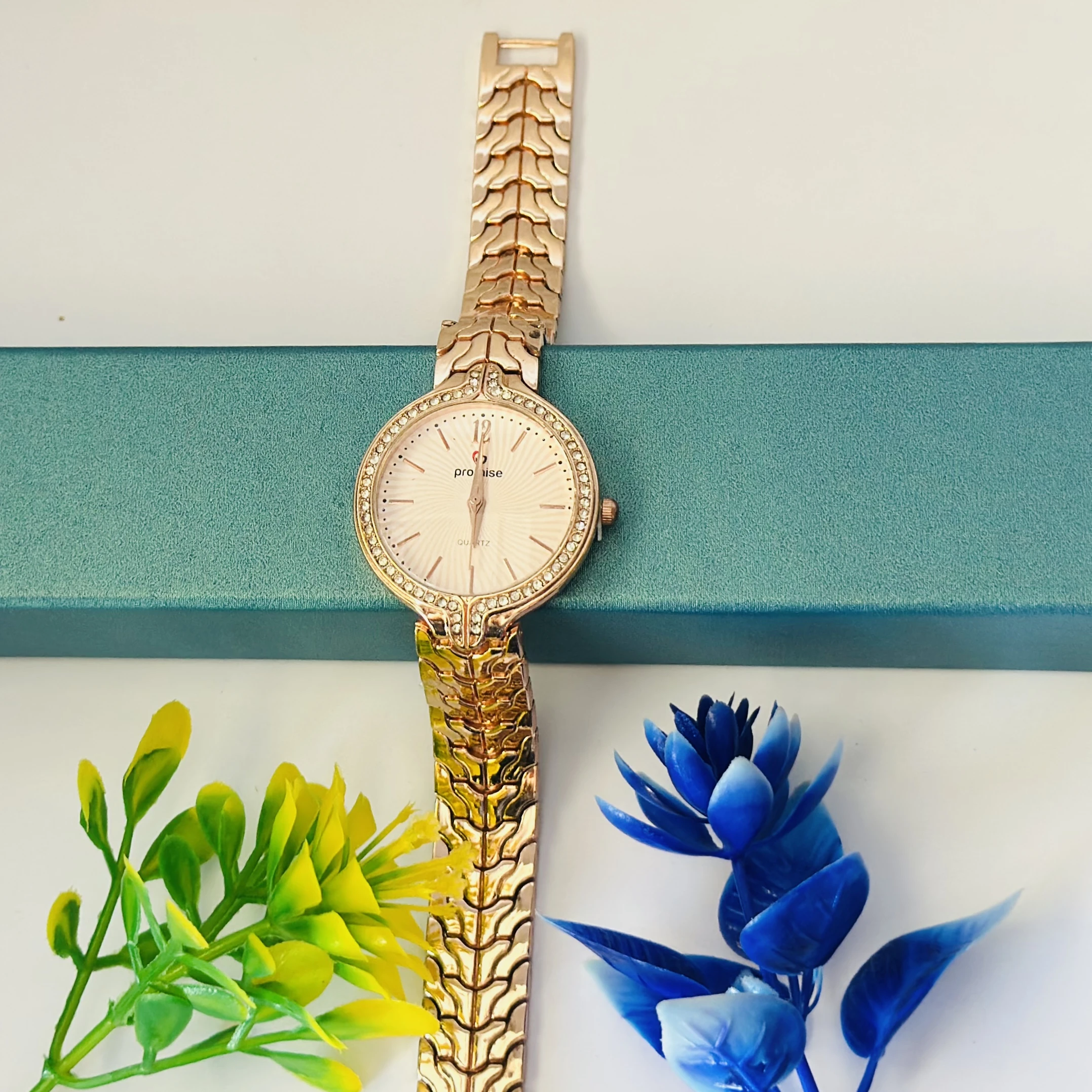 Rose gold analog women's watch.