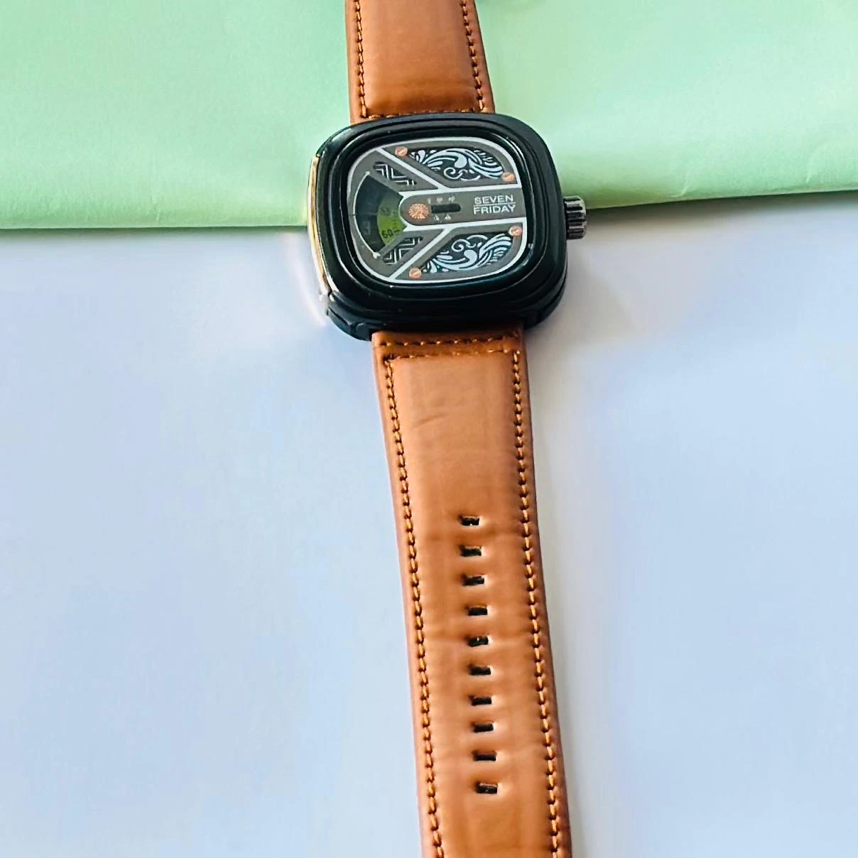 Brown analog watch