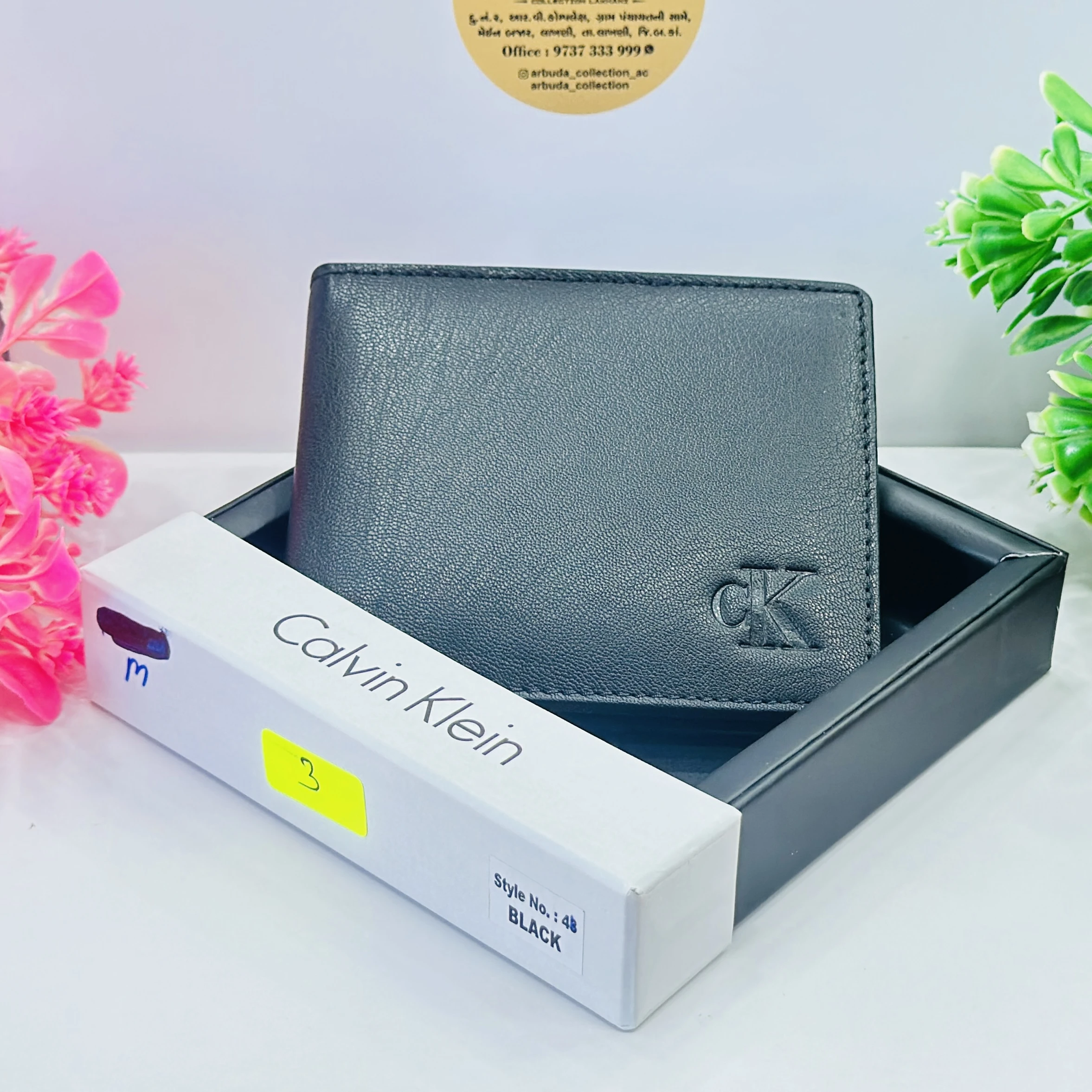 Calvin Klein Jeans Black Hardware Bifold Wallet.