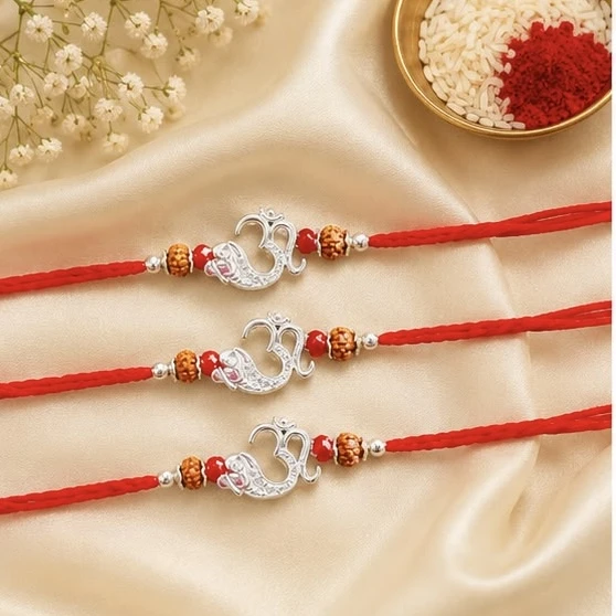 set features three sterling silver Om Rakhis designed for Raksha Bandhan.